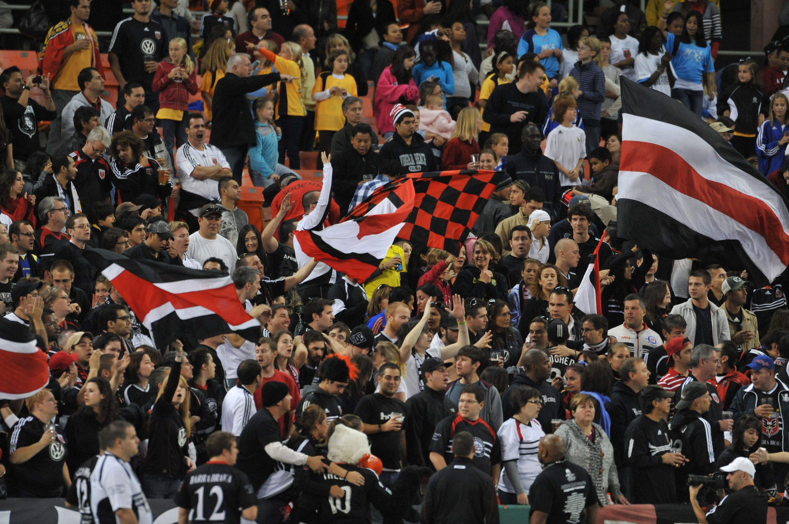 WASHINGTON, DC - OCTOBER 23:  Fans of D.C. United cheer against Toronto FC at RFK Stadium on October 23, 2010 in Washington, DC. Toronto defeated DC 3-2. (Photo by Larry French/Getty Images)