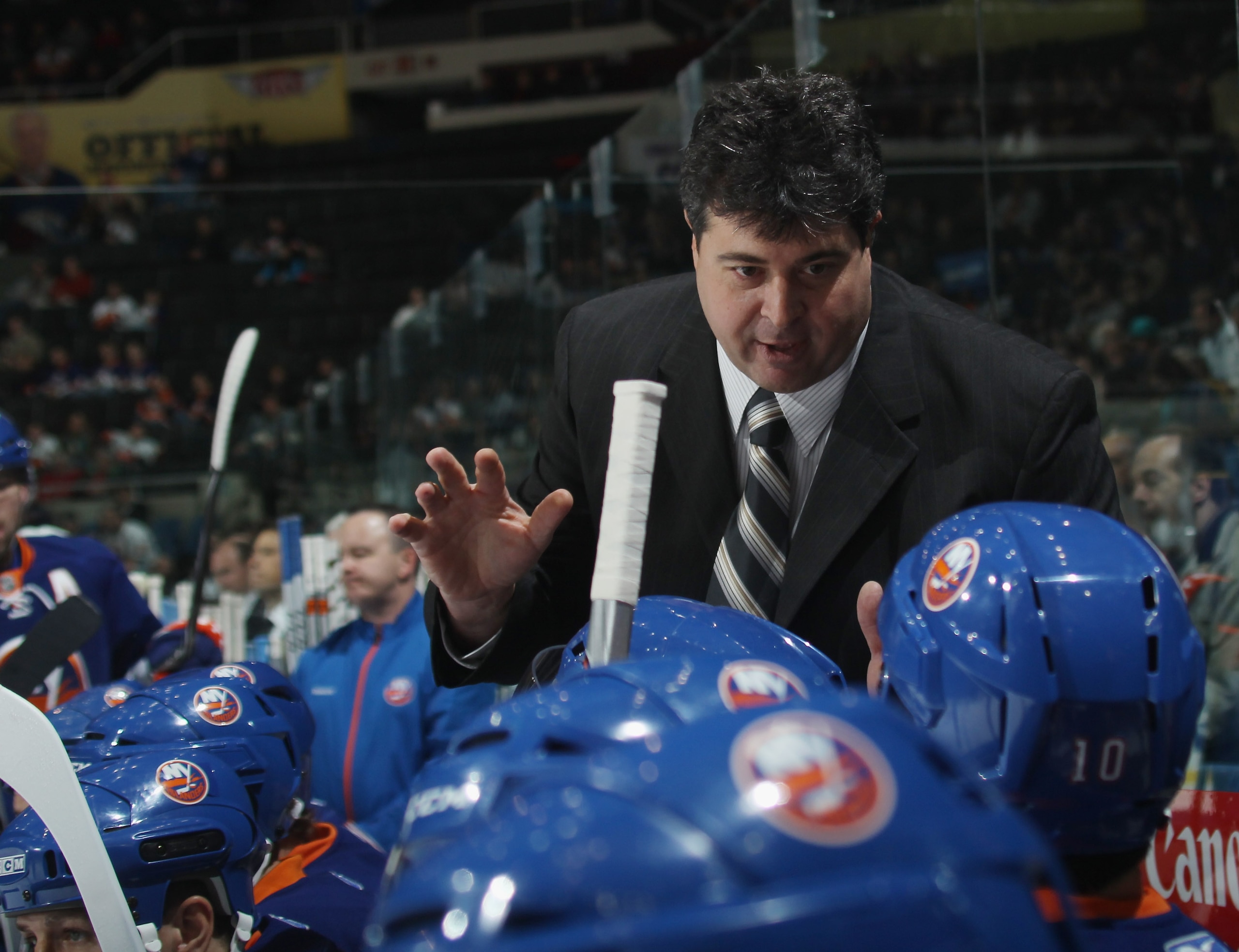 UNIONDALE, NY - NOVEMBER 17:  Head coach Jack Capuano of the New York Islanders works the bench during his first NHL game against the Tampa Bay Lightning at the Nassau Coliseum on November 17, 2010 in Uniondale, New York.  (Photo by Bruce Bennett/Getty Im