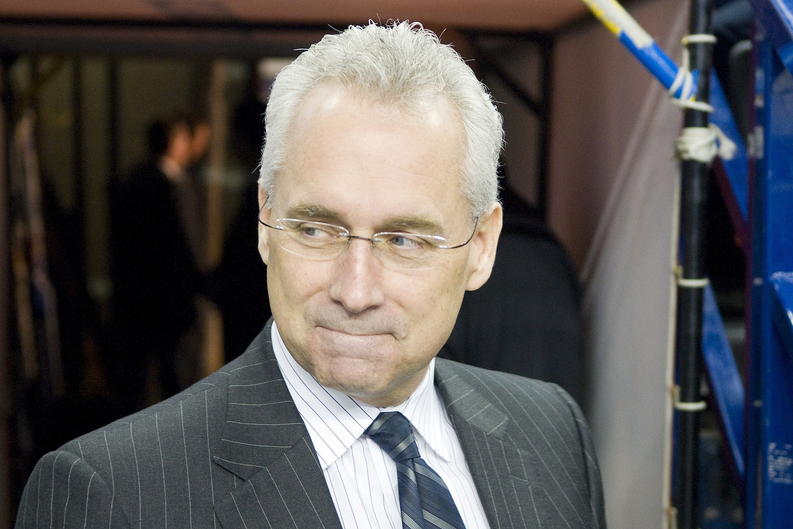 EDMONTON, CANADA - OCTOBER 16:  Tom Renney, head coach for the Edmonton Oilers, makes his way to the bench before a game against the Calgary Flames at the Scotiabank Saddledome  on October 16, 2010 in Calgary, Alberta, Canada.  The Flames beat the Oilers