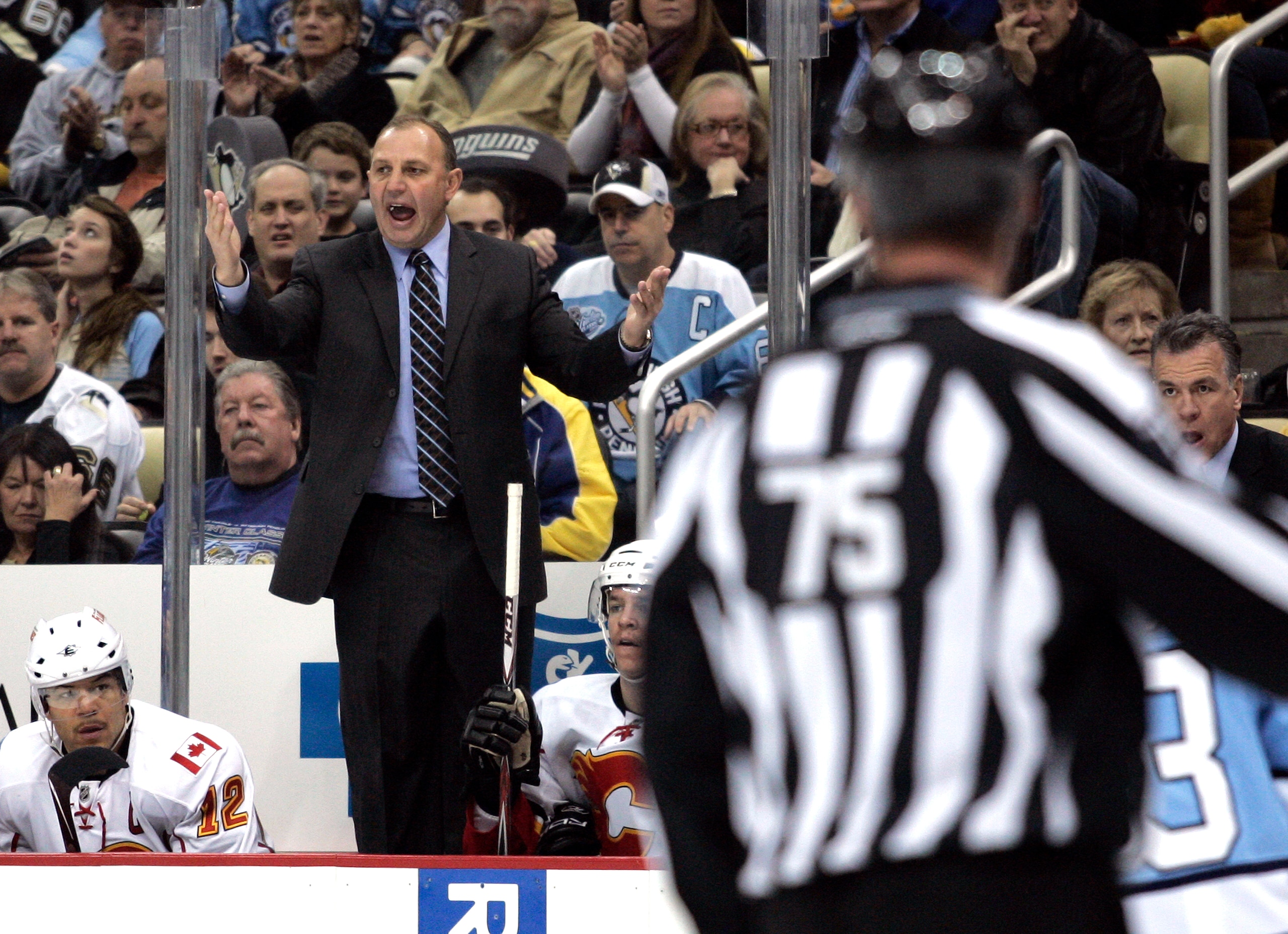 PITTSBURGH - NOVEMBER 27:  Calgary Flames head coach Brent Sutter argues a call against the Pittsburgh Penguins at Consol Energy Center on November 27, 2010 in Pittsburgh, Pennsylvania.  (Photo by Justin K. Aller/Getty Images)