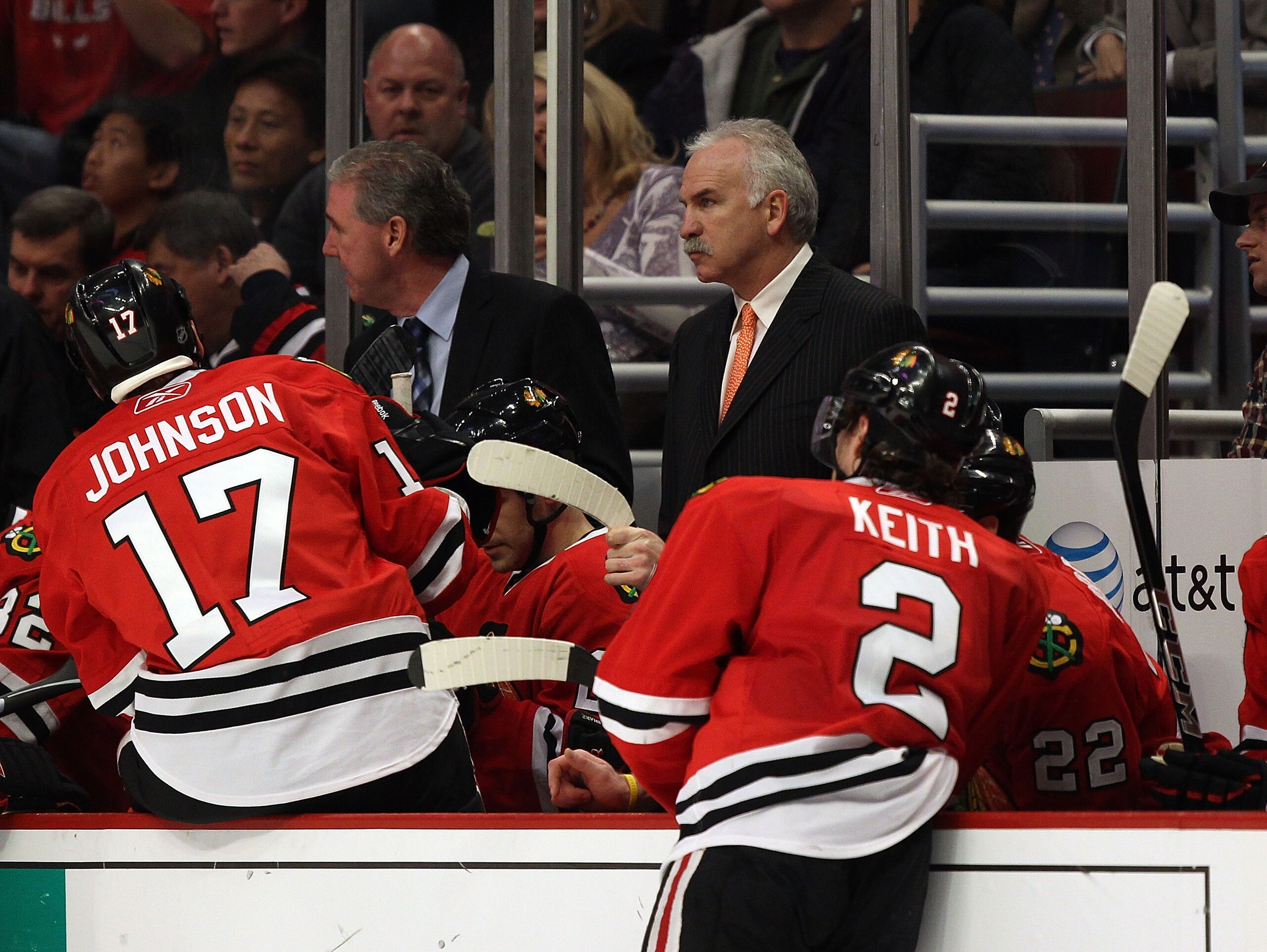 CHICAGO, IL - DECEMBER 30: Head coach Joel Quenneville of the Chicago Blackhawks talks to his team including Ryan Johnson #17 and Duncan Keith #2 during a break against the San Jose Sharks at the United Center on December 30, 2010 in Chicago, Illinois. Th