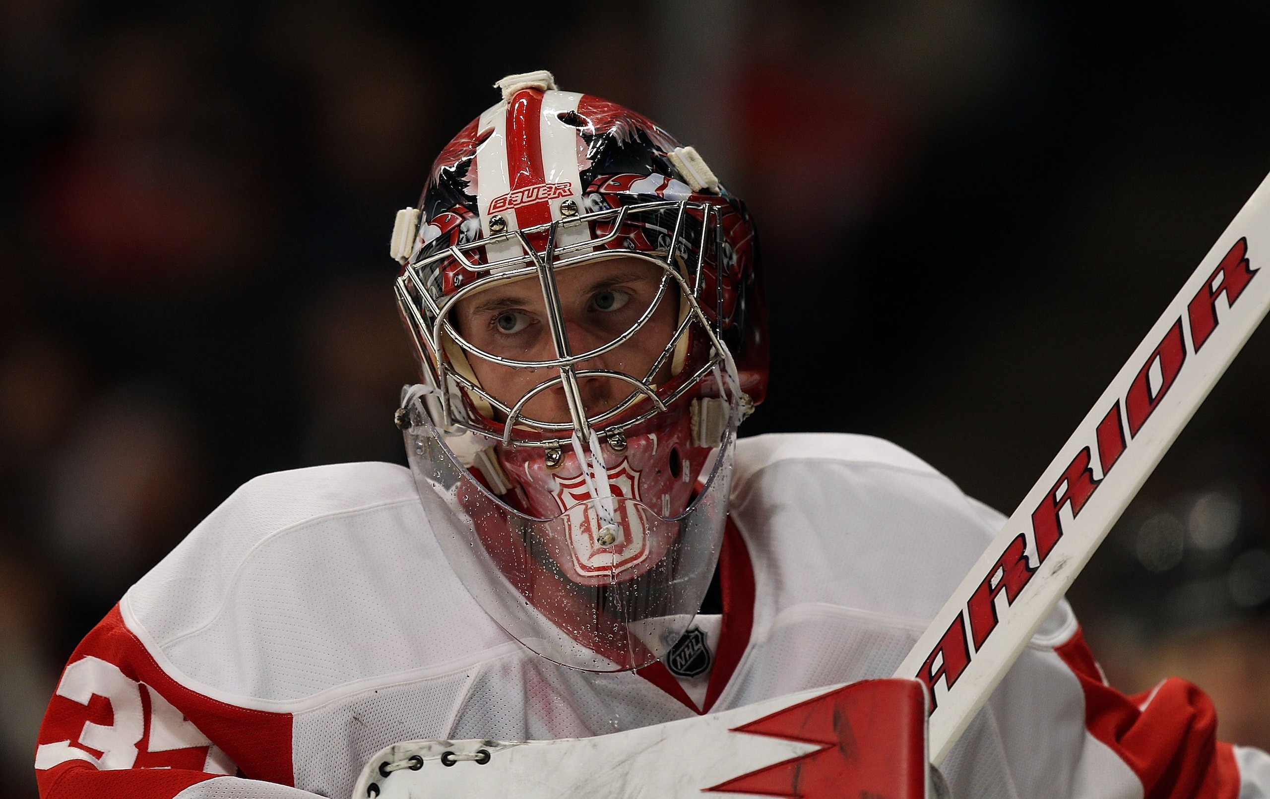 CHICAGO, IL - DECEMBER 17: Jimmy Howard #35 of the Detroit Red Wings rests during a break in the action against the Chicago Blackhawks at the United Center on December 17, 2010 in Chicago, Illinois. The Blackhawks defeated the Red Wings 4-1. (Photo by Jon