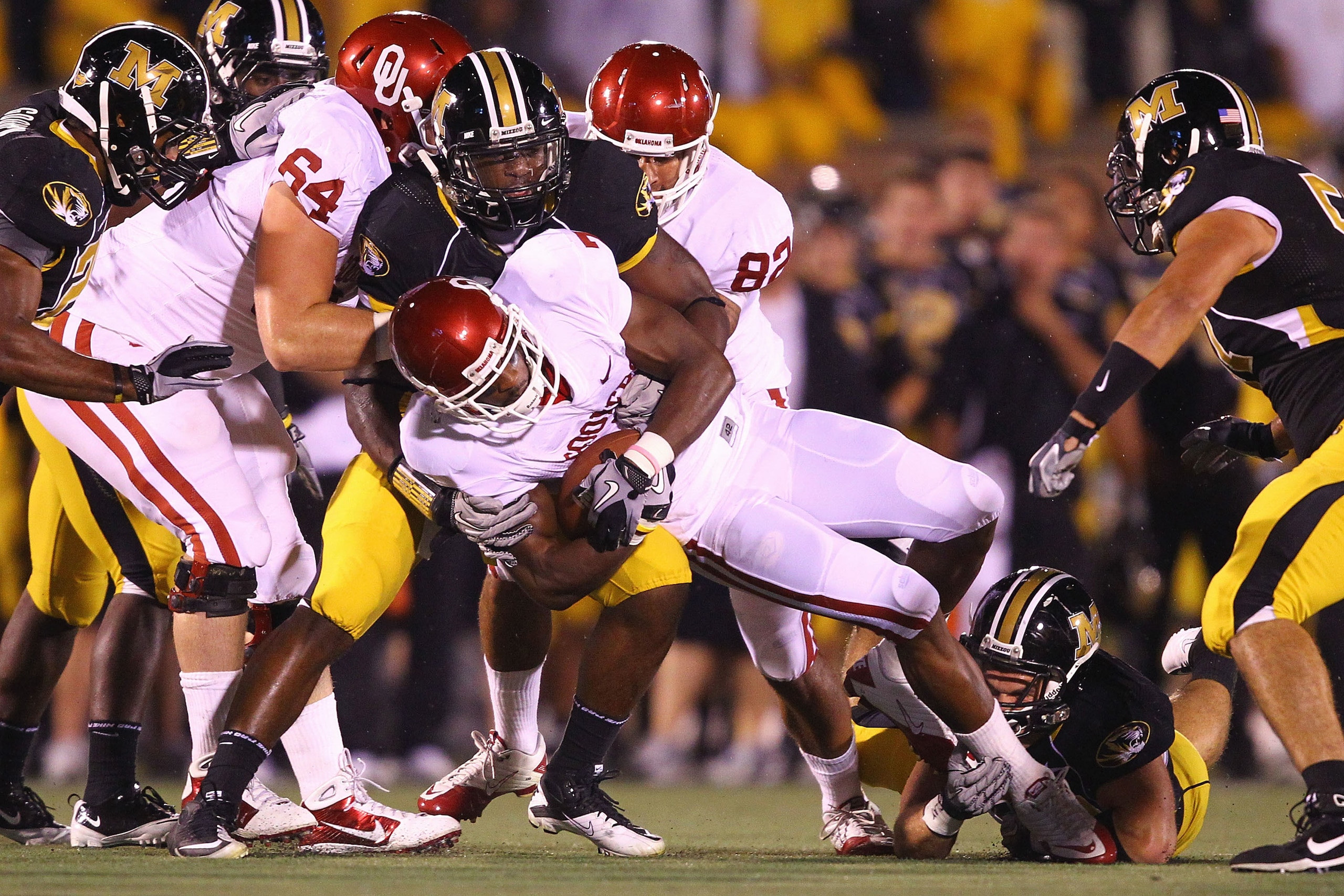 COLUMBIA, MO - OCTOBER 23: DeMarco Murray #7 of the Oklahoma Sooners is tackled by Jacquies Smith #3 of the Missouri Tigers at Faurot Field/Memorial Stadium on October 23, 2010 in Columbia, Missouri. (Photo by Dilip Vishwanat/Getty Images) COLUMBIA, MO - OCTOBER 23: DeMarco Murray #7 of the Oklahoma Sooners is tackled by Jacquies Smith #3 of the Missouri Tigers at Faurot Field/Memorial Stadium on October 23, 2010 in Columbia, Missouri. (Photo by Dilip Vishwanat/Getty Images)