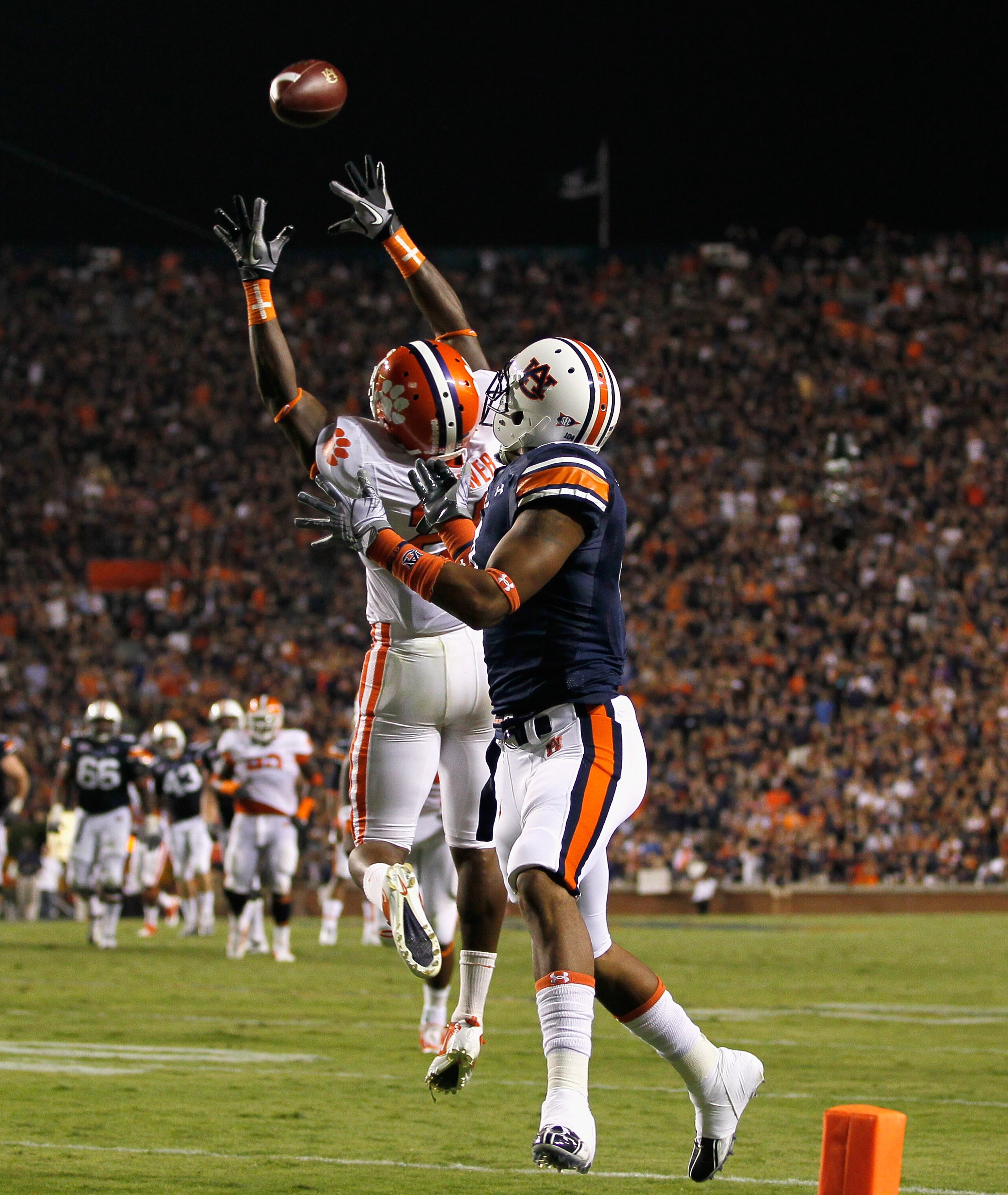 AUBURN, AL - SEPTEMBER 18: Xavier Brewer #29 of the Clemson Tigers intercepts a pass intended for Shaun Kitchens #4 of the Auburn Tigers at Jordan-Hare Stadium on September 18, 2010 in Auburn, Alabama. (Photo by Kevin C. Cox/Getty Images) AUBURN, AL - SEPTEMBER 18: Xavier Brewer #29 of the Clemson Tigers intercepts a pass intended for Shaun Kitchens #4 of the Auburn Tigers at Jordan-Hare Stadium on September 18, 2010 in Auburn, Alabama. (Photo by Kevin C. Cox/Getty Images)
