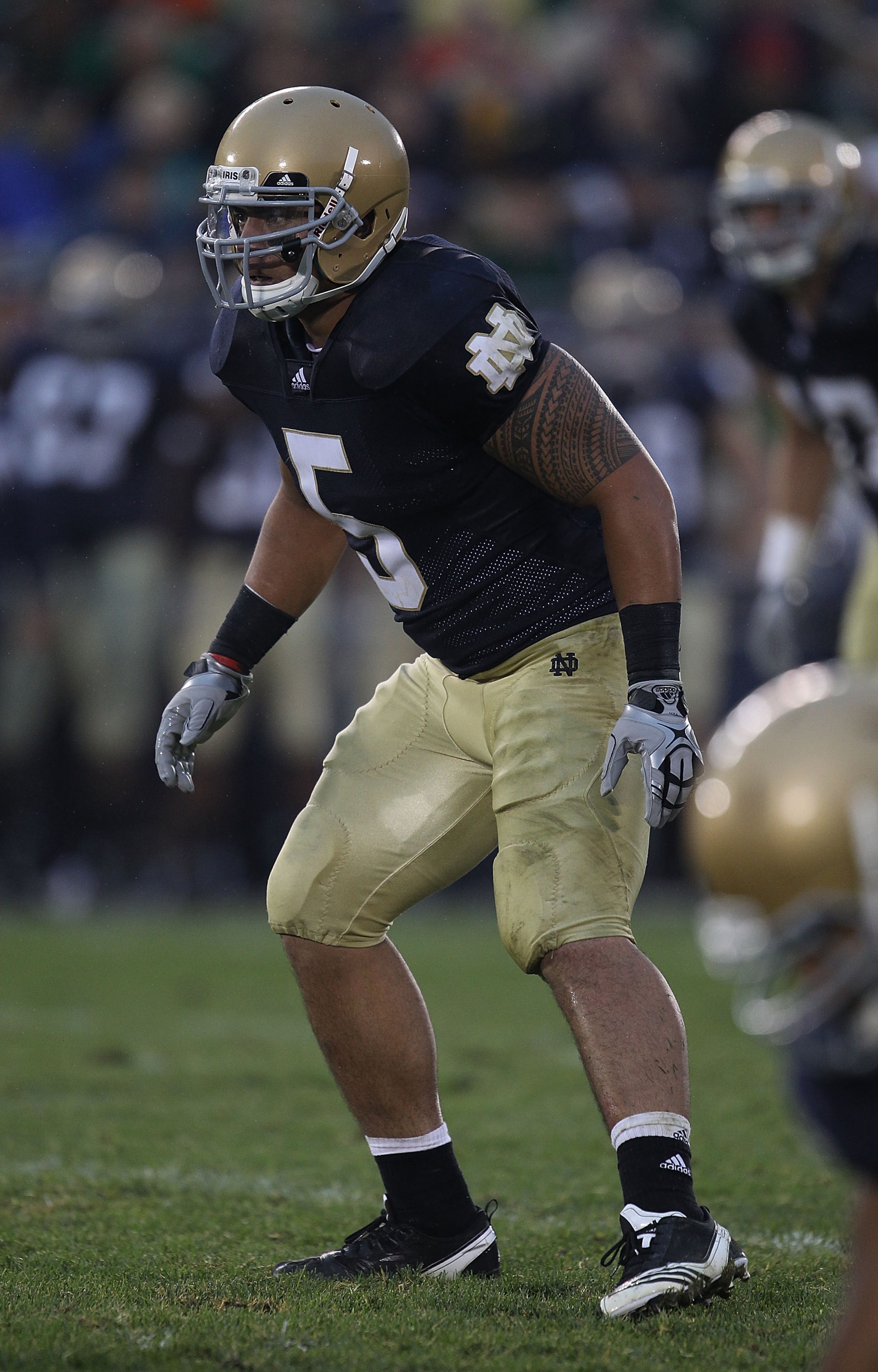SOUTH BEND, IN - SEPTEMBER 11: Manti Te'o #5 of the Notre Dame Fighting Irish awaits the start of play against the Michigan Wolverines at Notre Dame Stadium on September 11, 2010 in South Bend, Indiana. Michigan defeated Notre Dame 28-24. (Photo by Jonath SOUTH BEND, IN - SEPTEMBER 11: Manti Te'o #5 of the Notre Dame Fighting Irish awaits the start of play against the Michigan Wolverines at Notre Dame Stadium on September 11, 2010 in South Bend, Indiana. Michigan defeated Notre Dame 28-24. (Photo by Jonath