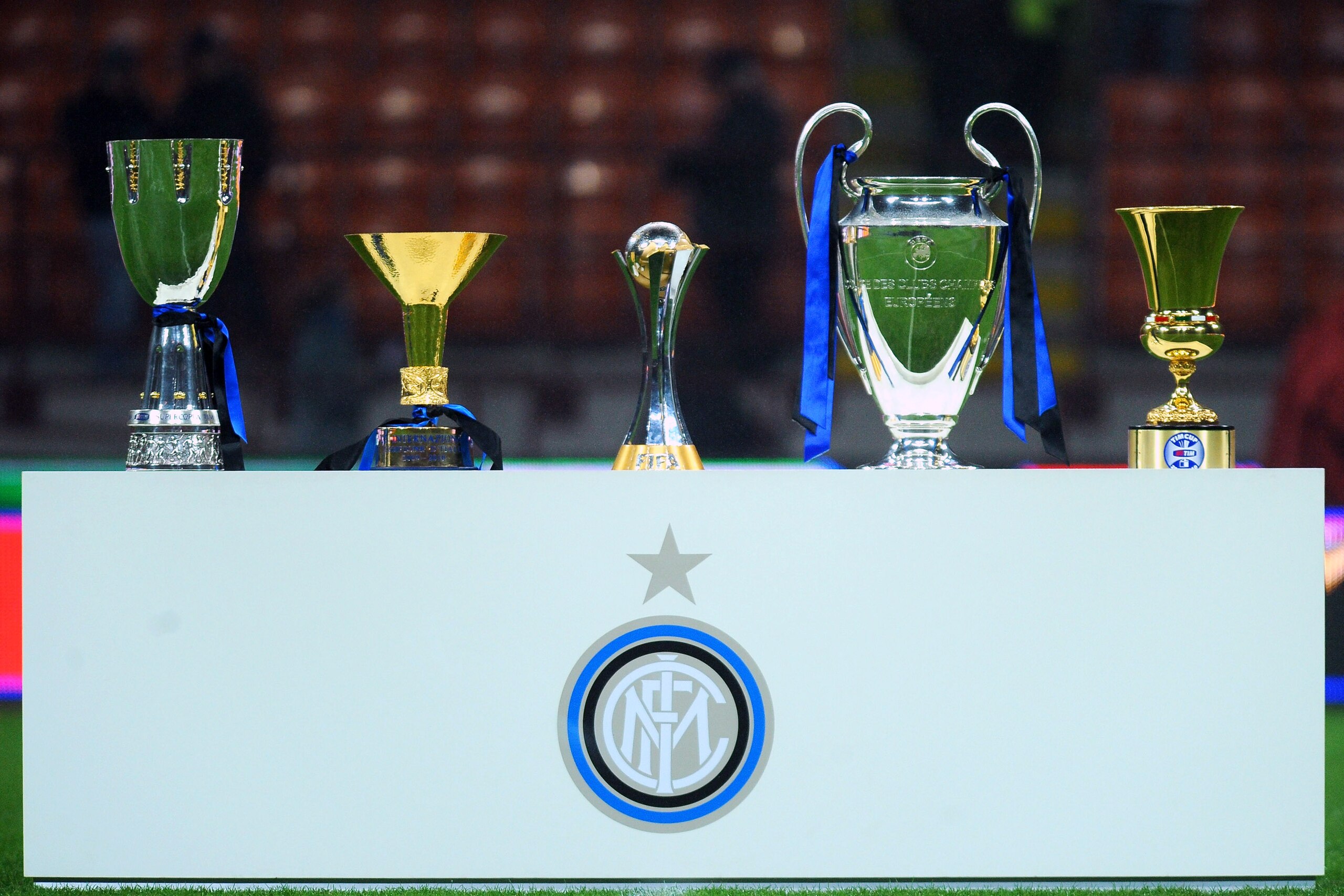 MILAN, ITALY - JANUARY 06:  The five trophies (L-R) the Supercoppa Italiana, the Scudetto trophy, the FIFA Club World Cup trophy, the Champions League trophy and the Coppa Italia won by Inter are displayed before the Serie A match between FC Internazional