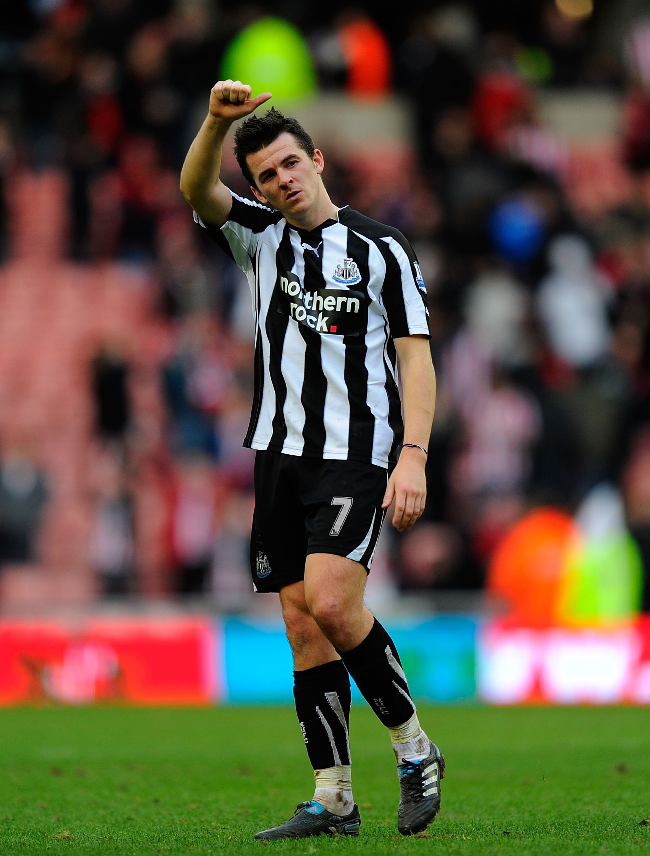 SUNDERLAND, ENGLAND - JANUARY 16:  Newcastle player Joey Barton acknowledges the fans during the Barclays Premier League match between Sunderland and Newcastle United at Stadium of Light on January 16, 2011 in Sunderland, England.  (Photo by Stu Forster/G