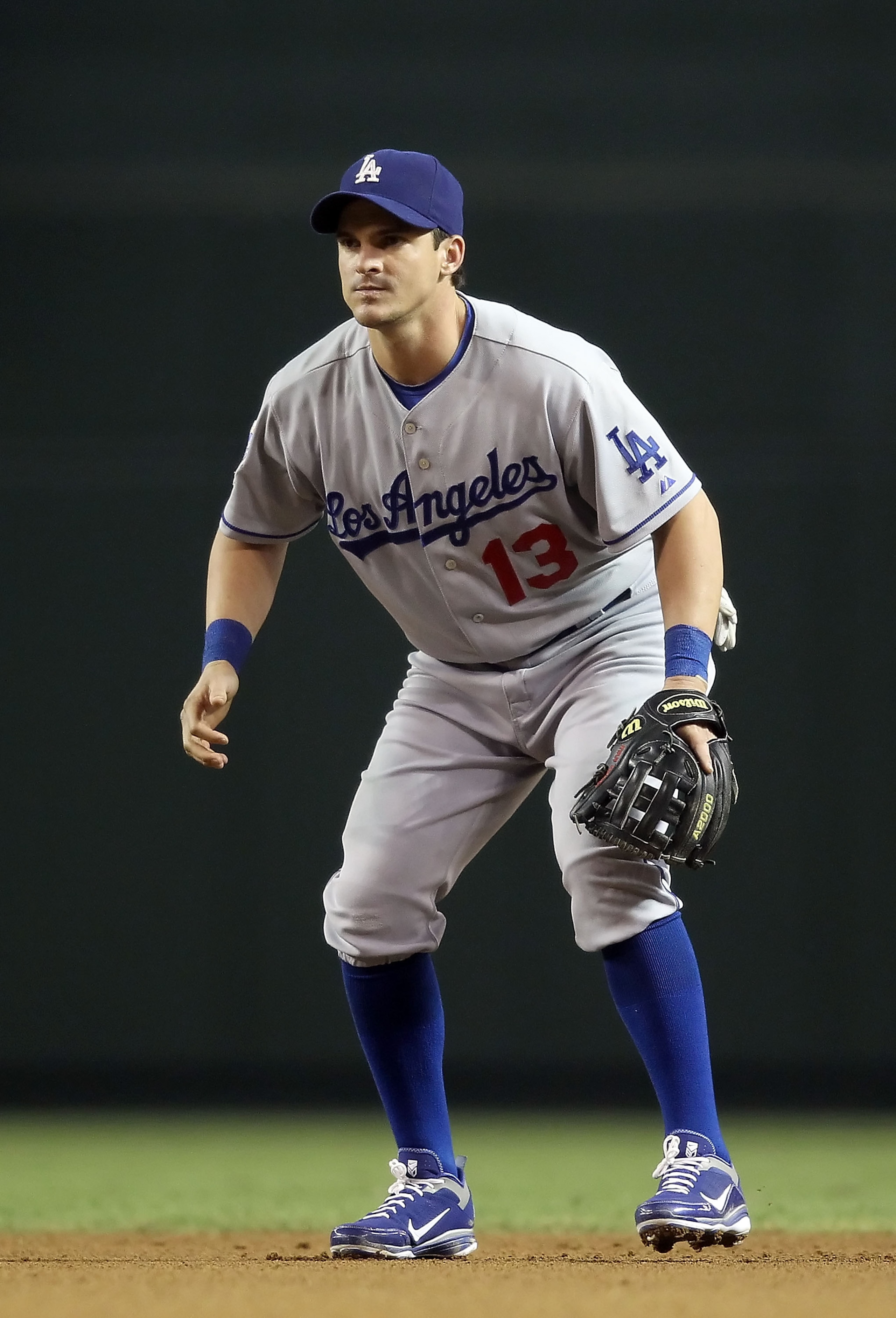 PHOENIX - SEPTEMBER 24:  Infielder Ryan Theriot #13 of the Los Angeles Dodgers in action during the Major League Baseball game against the Arizona Diamondbacks at Chase Field on September 24, 2010 in Phoenix, Arizona.  The Dodgers defeated the Diamondback