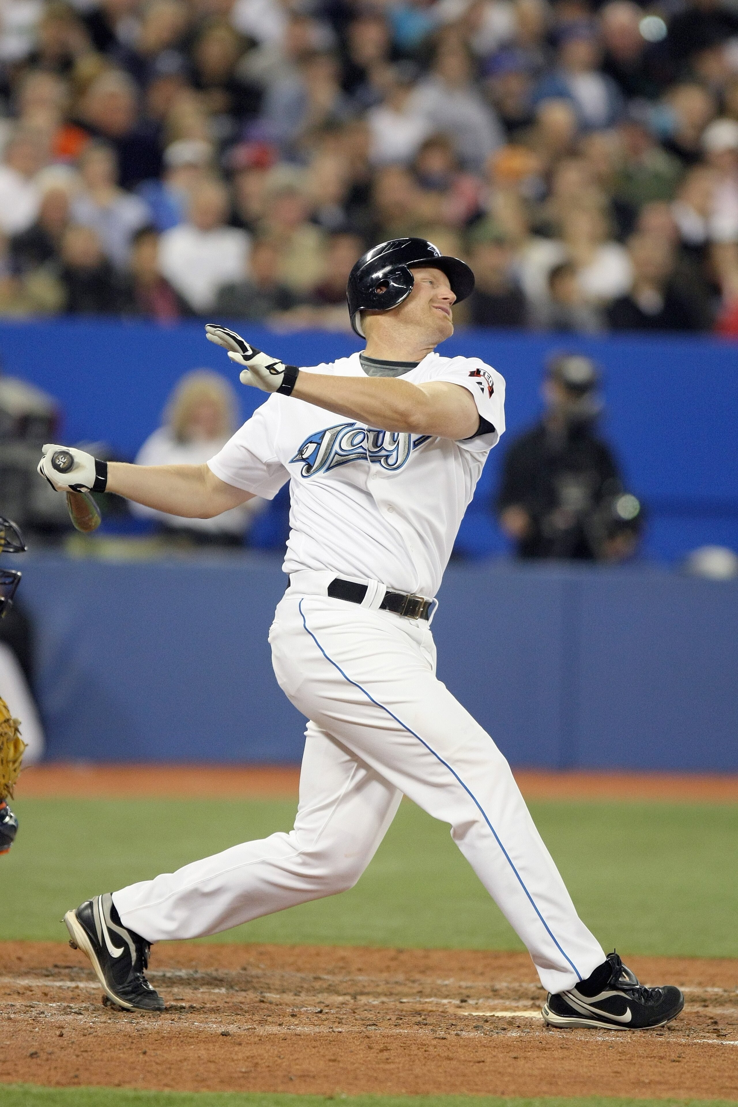 TORONTO - APRIL 6:  Lyle Overbay #35 of the Toronto Blue Jays sings at the pitch during the Opening Day game against the Detroit Tigers at the Rogers Centre on April 6, 2009 in Toronto, Ontario. (Photo by: Dave Sandford/Getty Images)