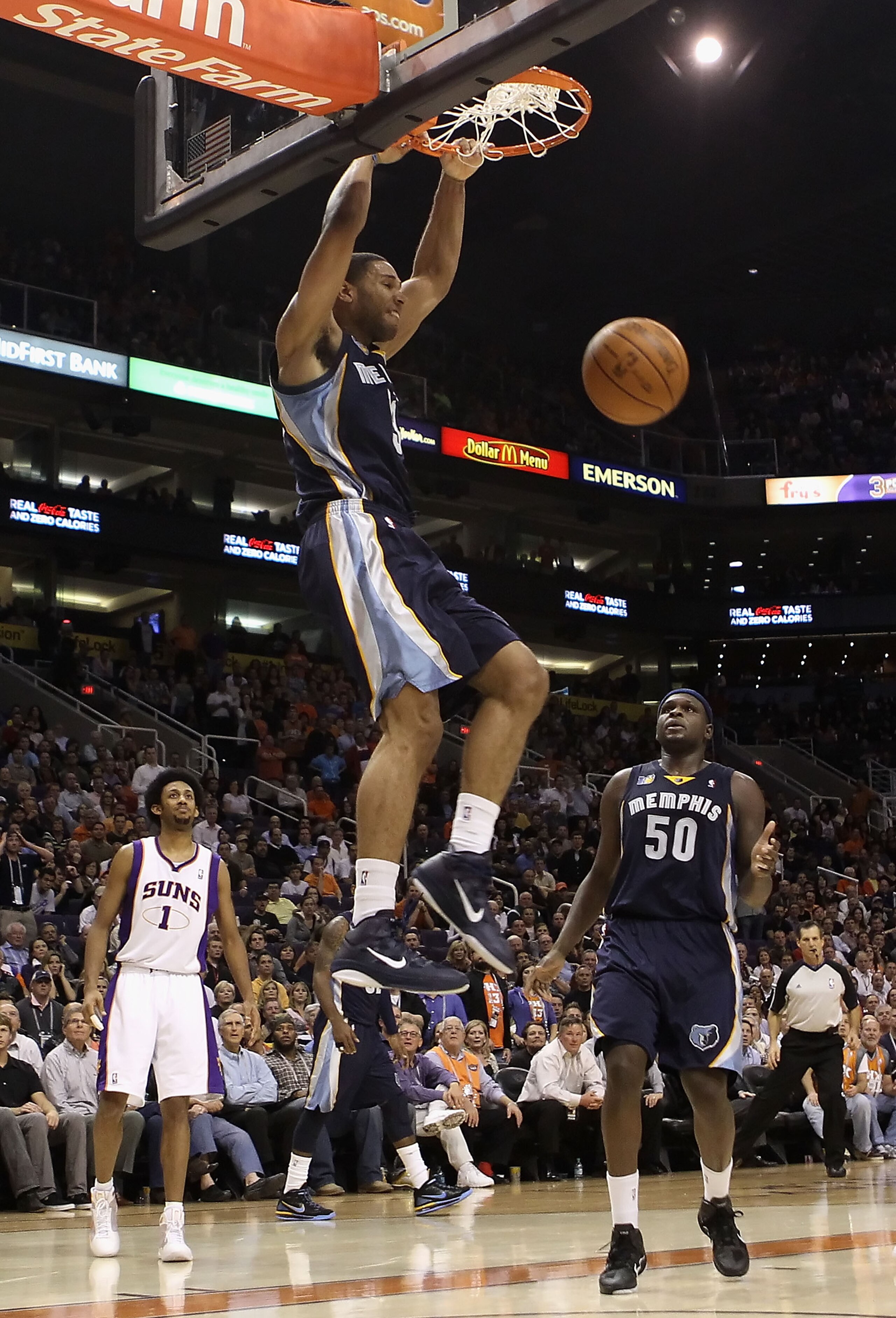PHOENIX - DECEMBER 08: Xavier Henry #13 of the Memphis Grizzlies slam dunks the ball against the Phoenix Suns during the NBA game at US Airways Center on December 8, 2010 in Phoenix, Arizona. NOTE TO USER: User expressly acknowledges and agrees that, by PHOENIX - DECEMBER 08: Xavier Henry #13 of the Memphis Grizzlies slam dunks the ball against the Phoenix Suns during the NBA game at US Airways Center on December 8, 2010 in Phoenix, Arizona. NOTE TO USER: User expressly acknowledges and agrees that, by