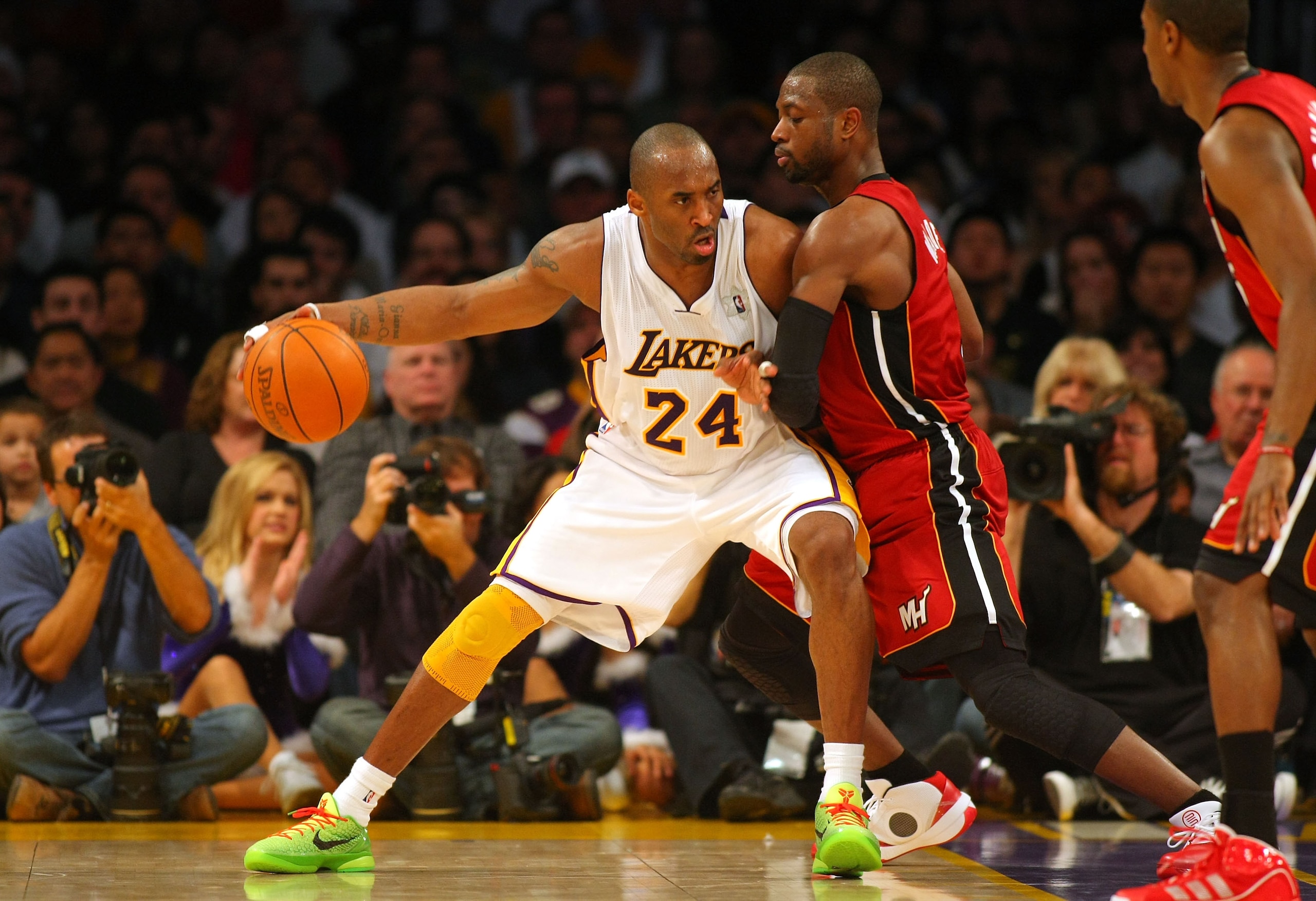 LOS ANGELES, CA - DECEMBER 25: Kobe Bryant #24 of the Los Angeles Lakers posts up Dwyane Wade #3 of the Miami Heat during the NBA game at Staples Center on December 25, 2010 in Los Angeles, California. (Photo by Victor Decolongon/Getty Images)
