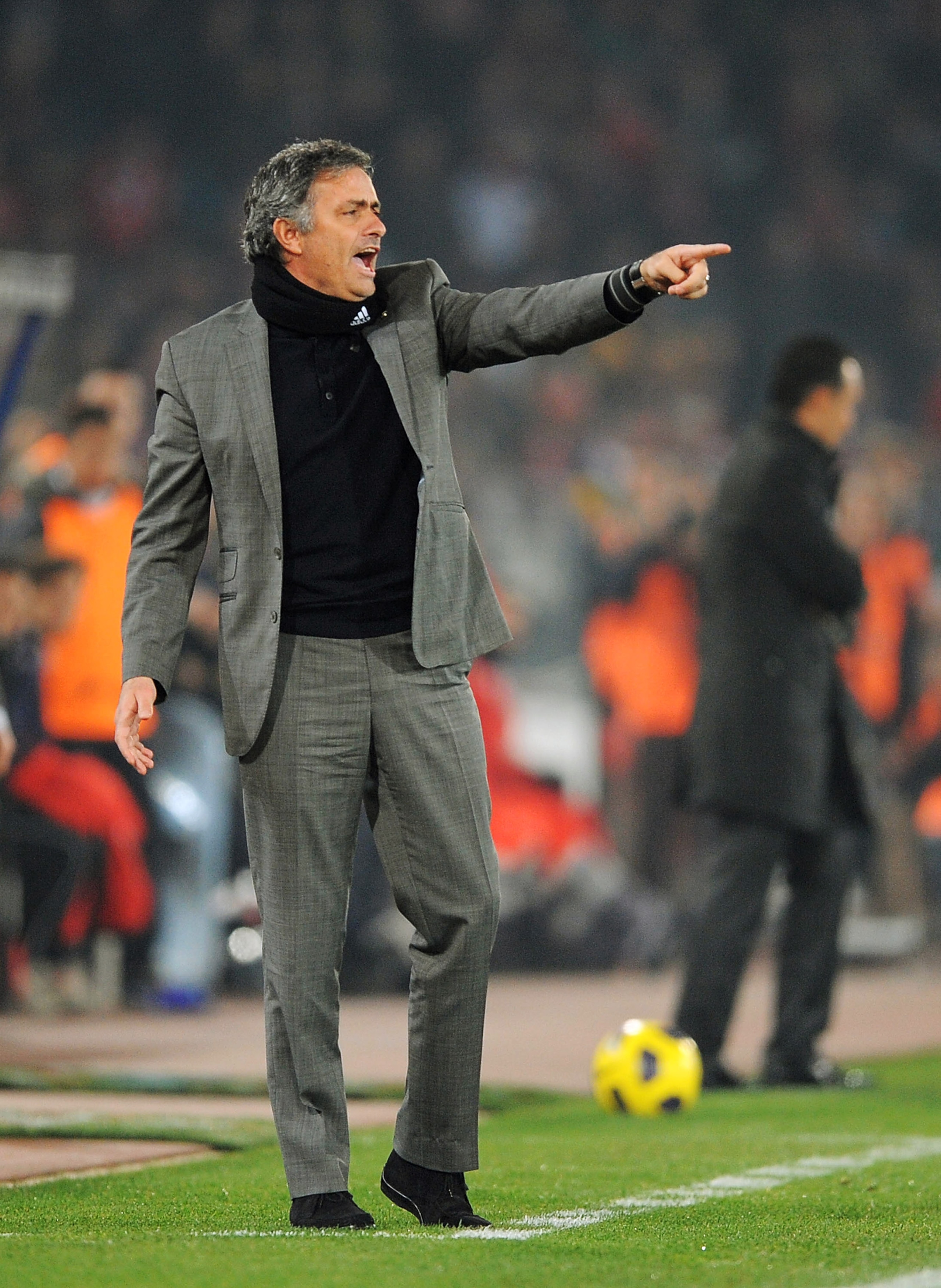 ALMERIA, SPAIN - JANUARY 16: Head coach Jose Mourinho of Real Madrid organises his side during the La Liga match between UD Almeria and Real Madrid at Estadio del Mediterraneo on January 16, 2011 in Almeria, Spain.  (Photo by Denis Doyle/Getty Images)