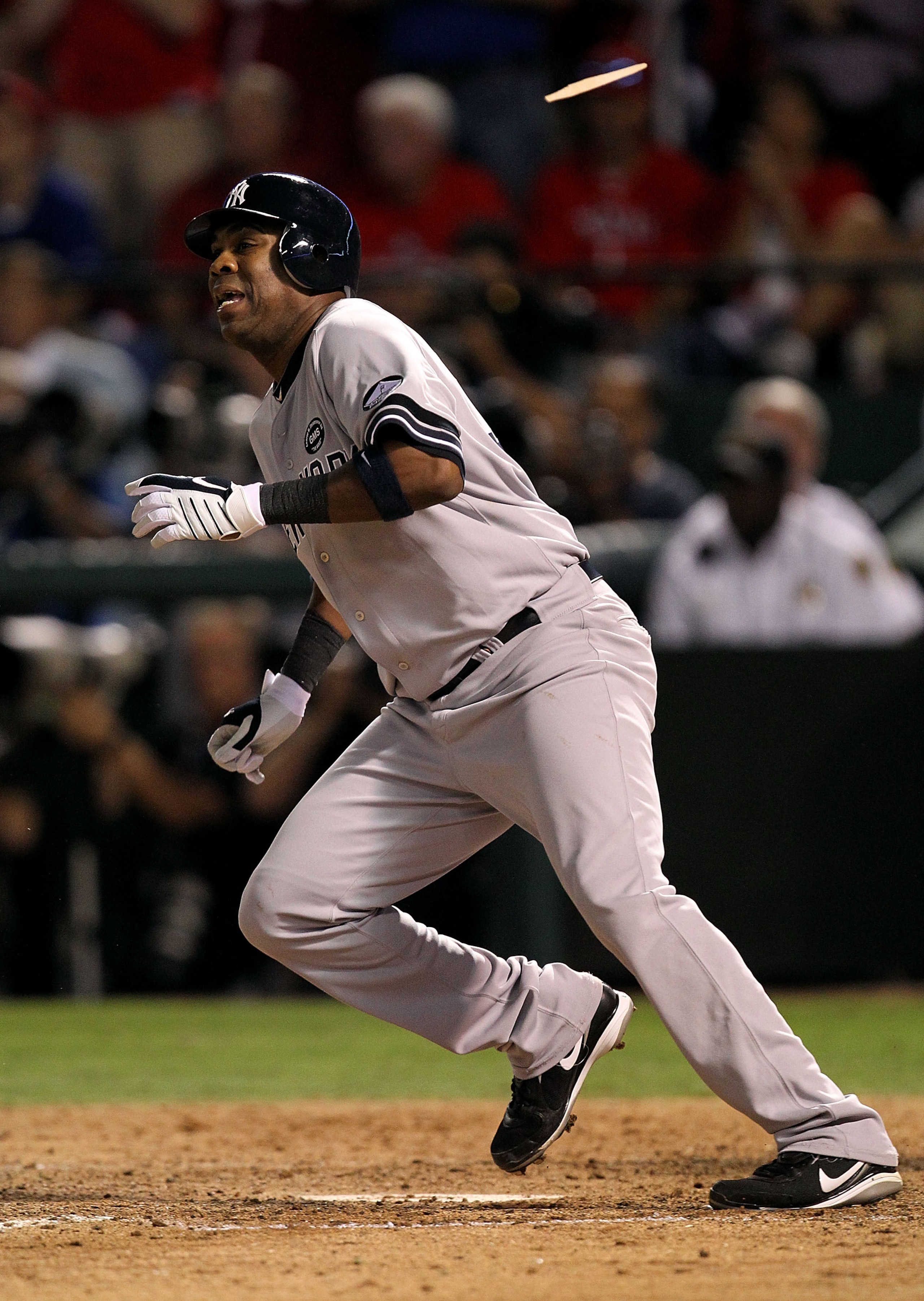 ARLINGTON, TX - OCTOBER 15:  Marcus Thames #38 of the New York Yankees runs out of the batter's box on a RBI single in the top of the eighth inning against the Texas Rangers in Game One of the ALCS during the 2010 MLB Playoffs at Rangers Ballpark in Arlin