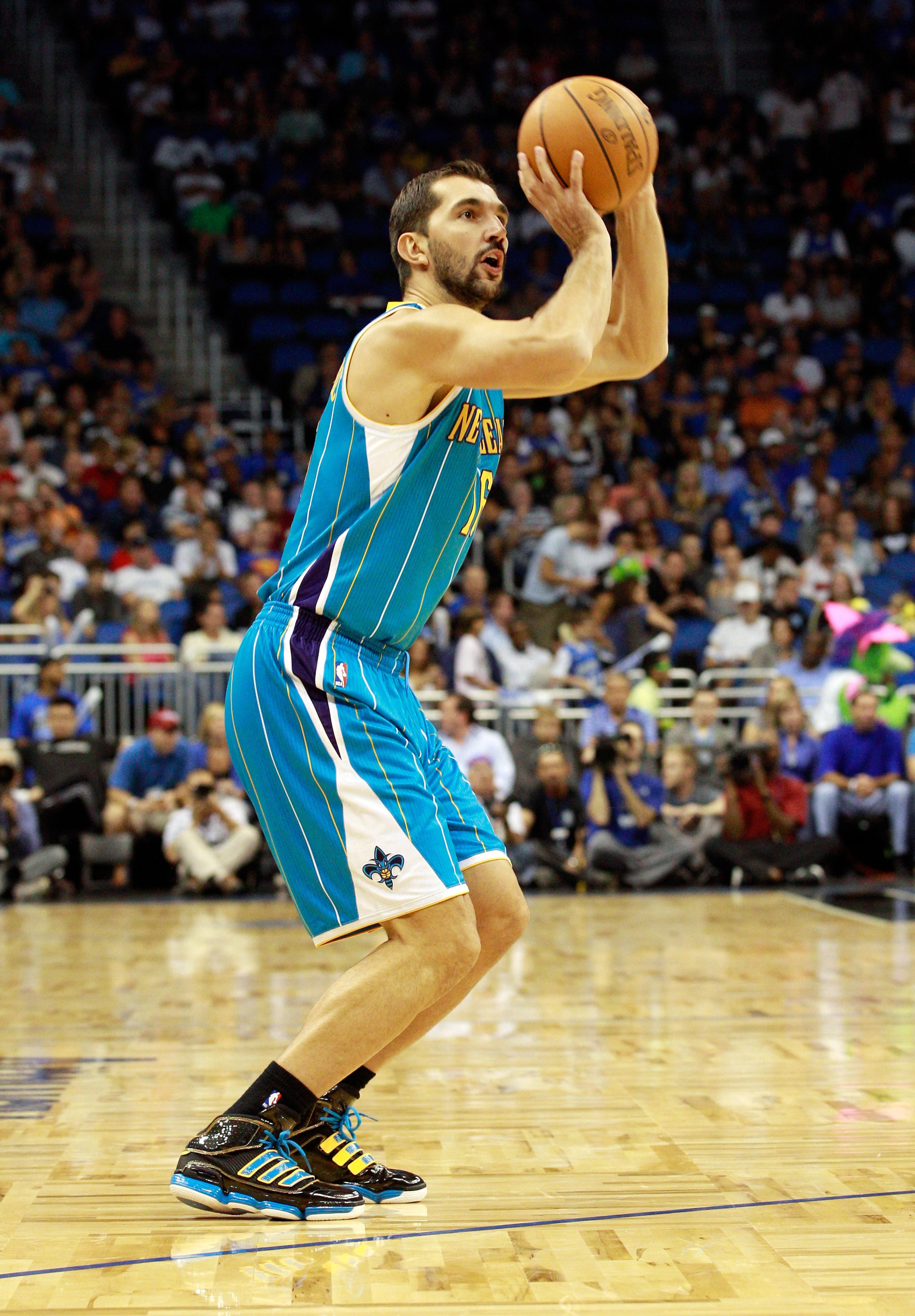 ORLANDO, FL - OCTOBER 10: Peja Stojakovic #16 of the New Orleans Hornets attempts a shot during the game against the Orlando Magic at Amway Arena on October 10, 2010 in Orlando, Florida. NOTE TO USER: User expressly acknowledges and agrees that, by downl ORLANDO, FL - OCTOBER 10: Peja Stojakovic #16 of the New Orleans Hornets attempts a shot during the game against the Orlando Magic at Amway Arena on October 10, 2010 in Orlando, Florida. NOTE TO USER: User expressly acknowledges and agrees that, by downl