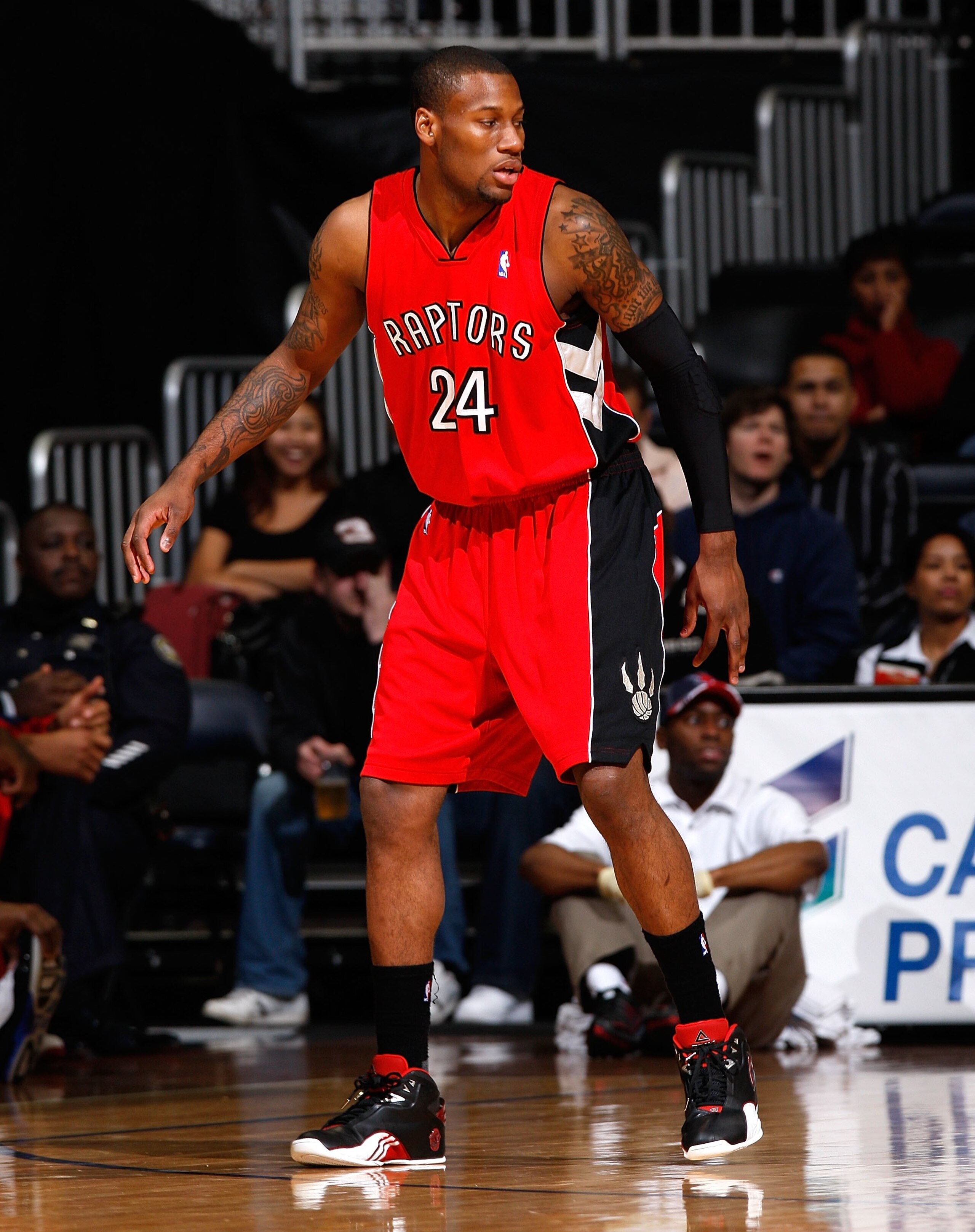 ATLANTA - DECEMBER 02: Sonny Weems #24 of the Toronto Raptors against the Atlanta Hawks at Philips Arena on December 2, 2009 in Atlanta, Georgia. NOTE TO USER: User expressly acknowledges and agrees that, by downloading and/or using this Photograph, Use ATLANTA - DECEMBER 02: Sonny Weems #24 of the Toronto Raptors against the Atlanta Hawks at Philips Arena on December 2, 2009 in Atlanta, Georgia. NOTE TO USER: User expressly acknowledges and agrees that, by downloading and/or using this Photograph, Use
