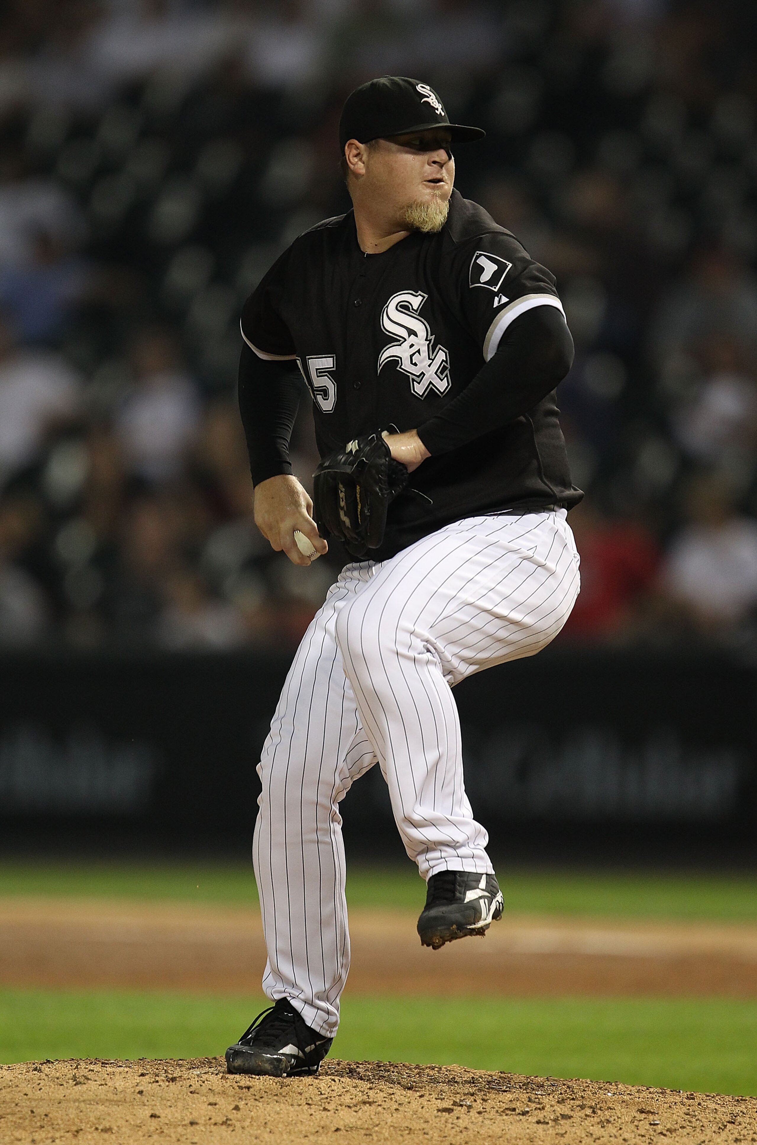 CHICAGO - AUGUST 10: Bobby Jenks #45 of the Chicago White Sox pitches against the Minnesota Twins at U.S. Cellular Field on August 10, 2010 in Chicago, Illinois. The Twins defeated the White Sox 12-6. (Photo by Jonathan Daniel/Getty Images)