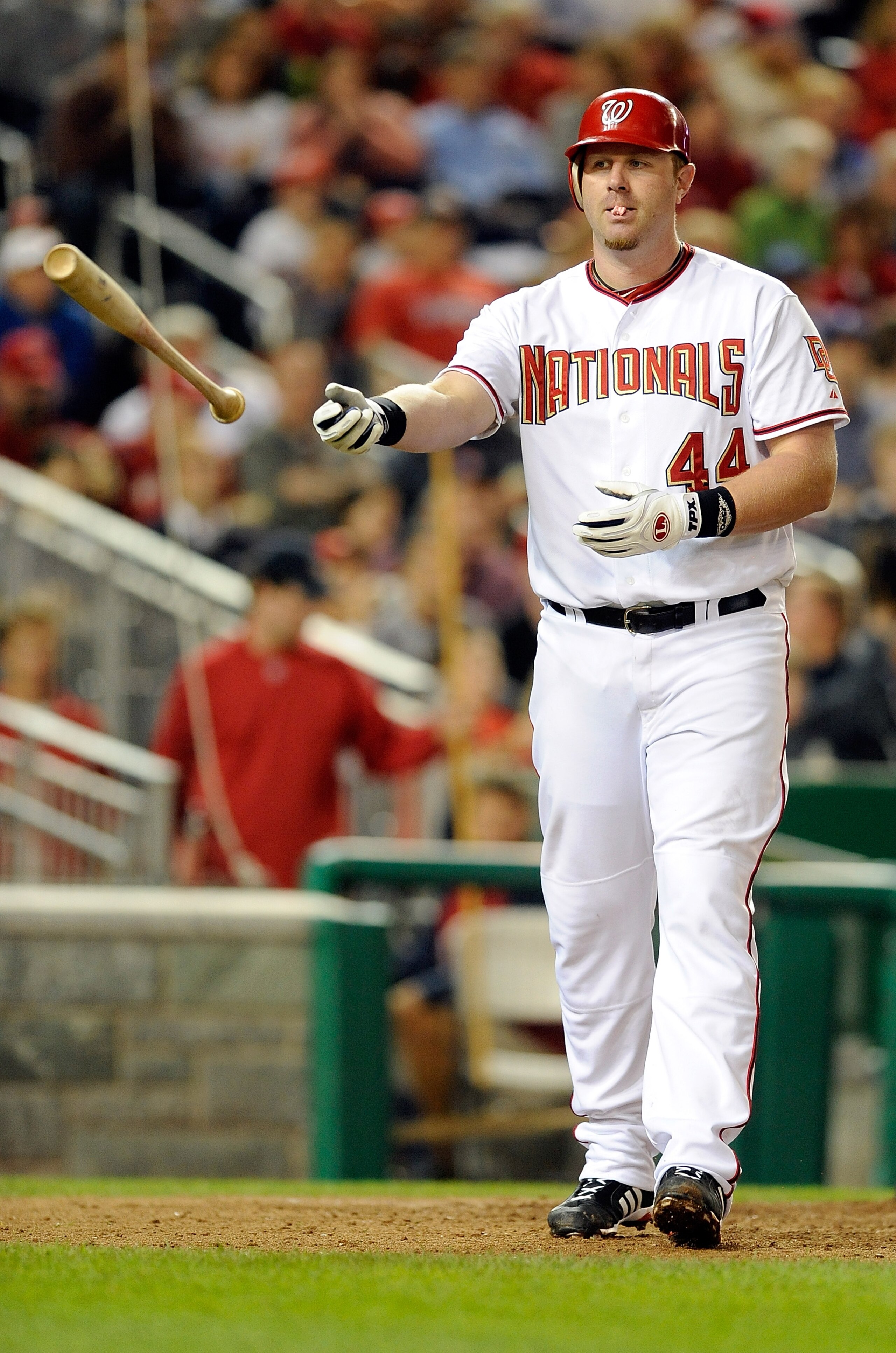 WASHINGTON - SEPTEMBER 29:  Adam Dunn #44 of the Washington Nationals tosses his bat after striking out against the Philadelphia Phillies at Nationals Park on September 29, 2010 in Washington, DC.  (Photo by Greg Fiume/Getty Images)