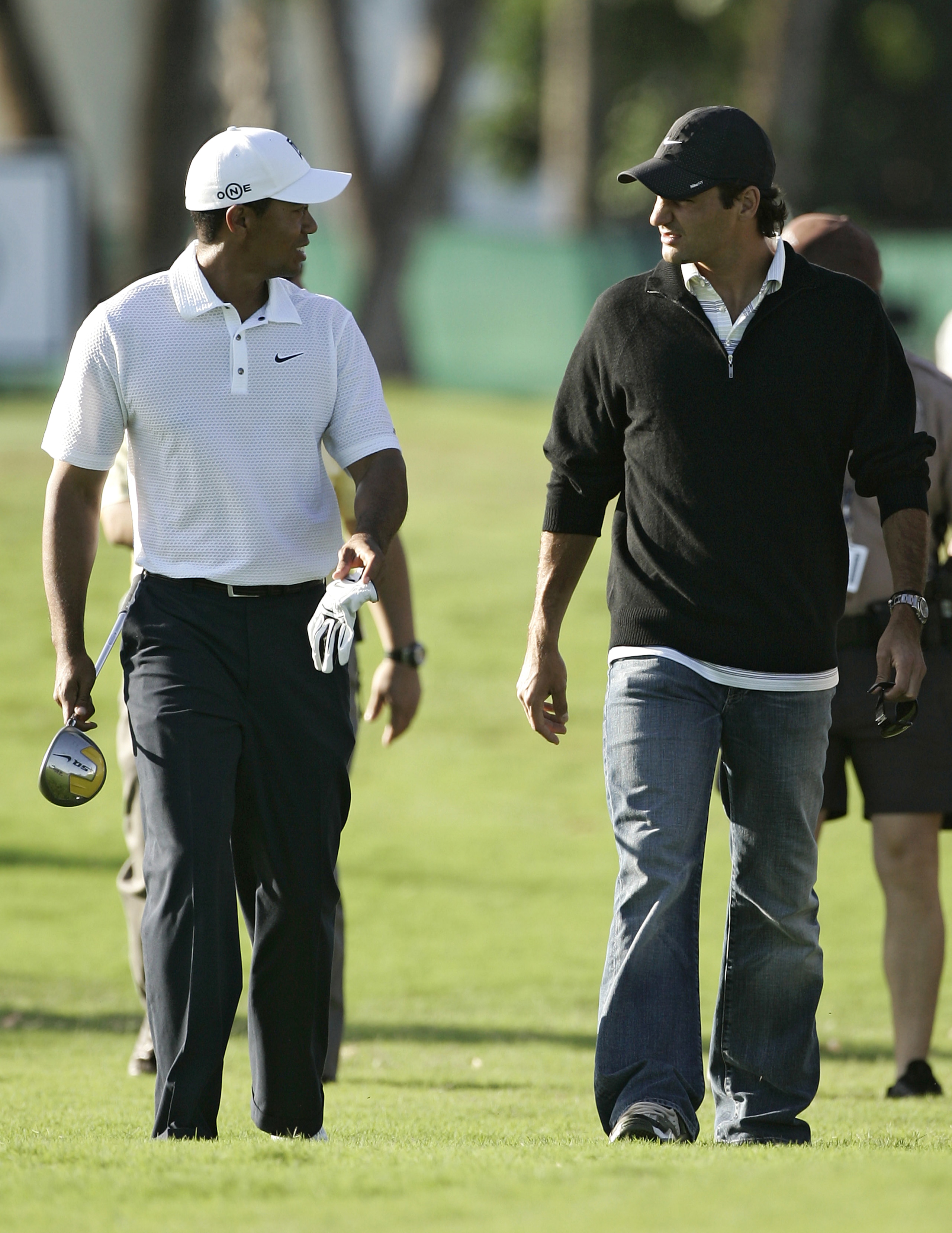 UNITED STATES - MARCH 21:  Tiger Woods and Roger Federer during a practice round at the CA Championship held at the Doral Resort and Spa on the Blue Monster Course in Miami, Florida on Wednesday, March 21, 2007.  (Photo by Sam Greenwood/Getty Images)