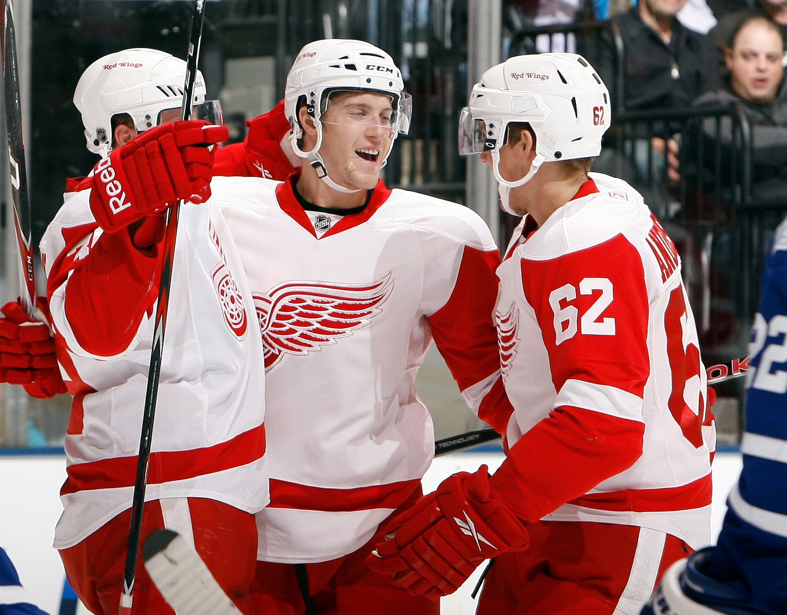 TORONTO - OCTOBER 2:  Jan Mursak #39, Cory Emmerton #48, and Joakim Andersson #62 of the Detroit Red Wings celebrate a goal against the Toronto Maple Leafs during a preseason NHL game at the Air Canada Centre October 2, 2010 in Toronto, Ontario, Canada. (
