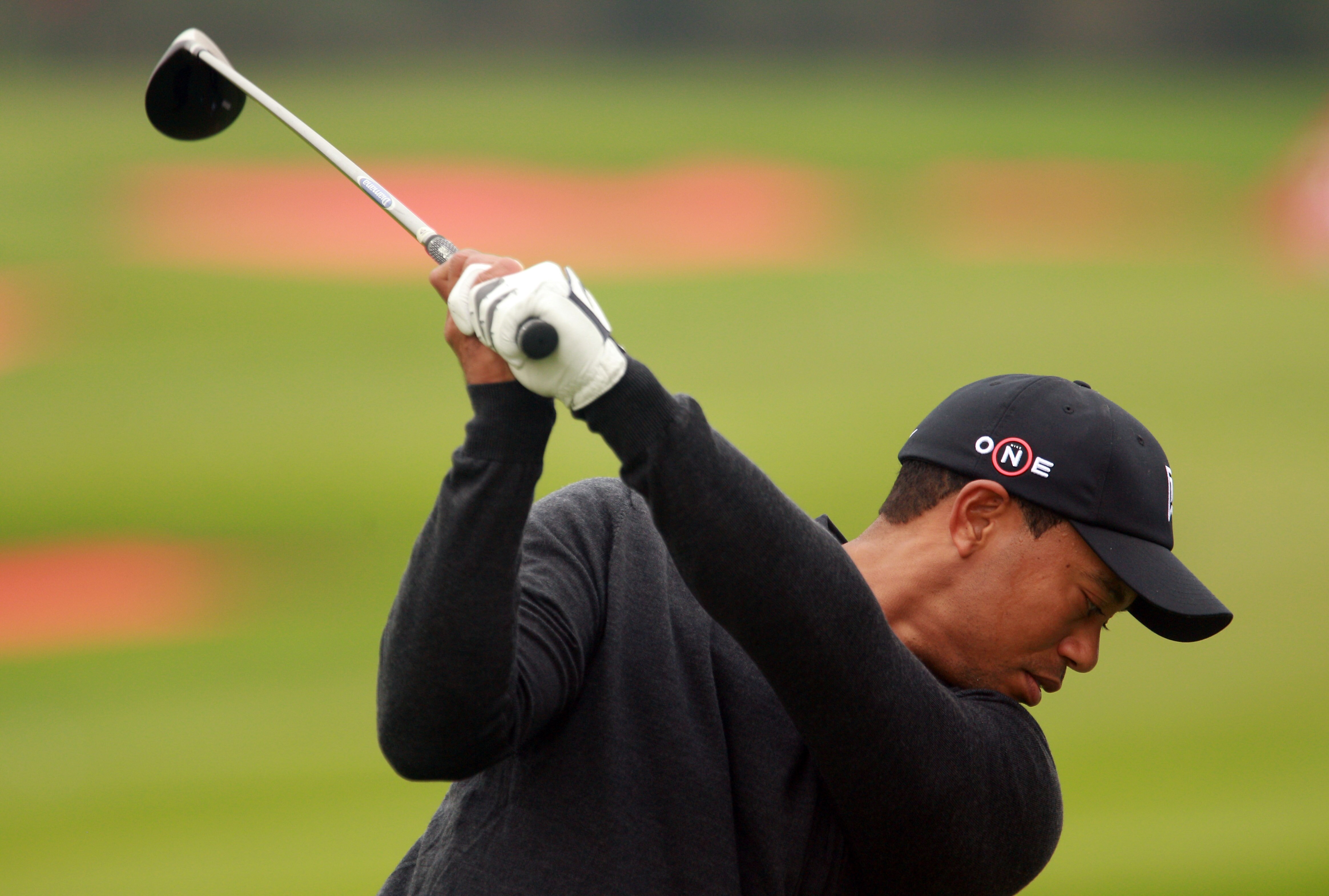 SHANGHAI, CHINA - NOVEMBER 02:  Tiger Woods of the USA on the range during practice prior to the start of the WGC-HSBC Champions at Sheshan International Golf Club on November 2, 2010 in Shanghai, China.  (Photo by Scott Halleran/Getty Images)