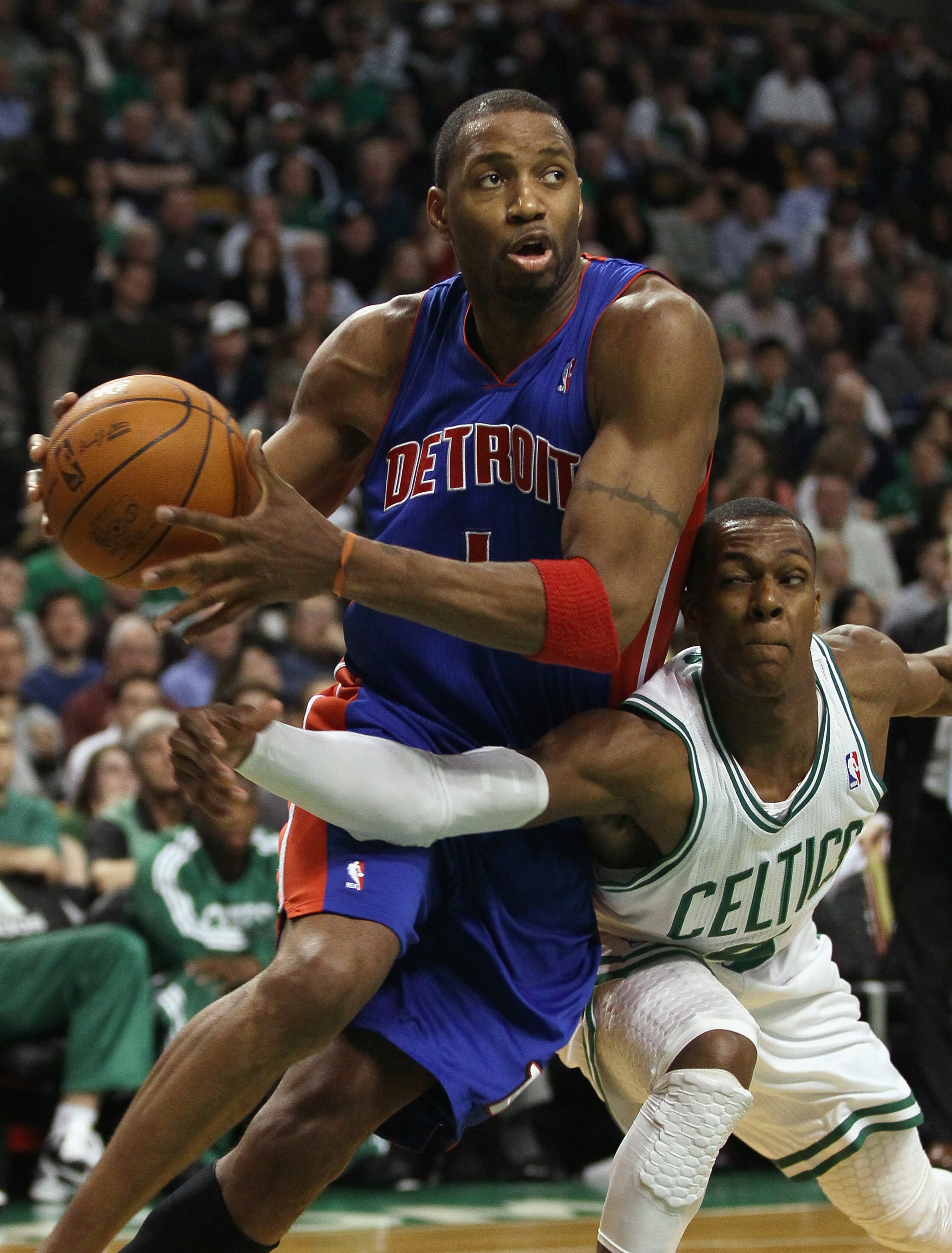 BOSTON, MA - JANUARY 19:  Tracy McGrady #1 of the Detroit Pistons tries to keep the ball from Rajon Rondo of the Boston Celtics on January 19, 2011 at the TD Garden in Boston, Massachusetts. The Celtics defeated the Pistons 86-82. NOTE TO USER: User expre