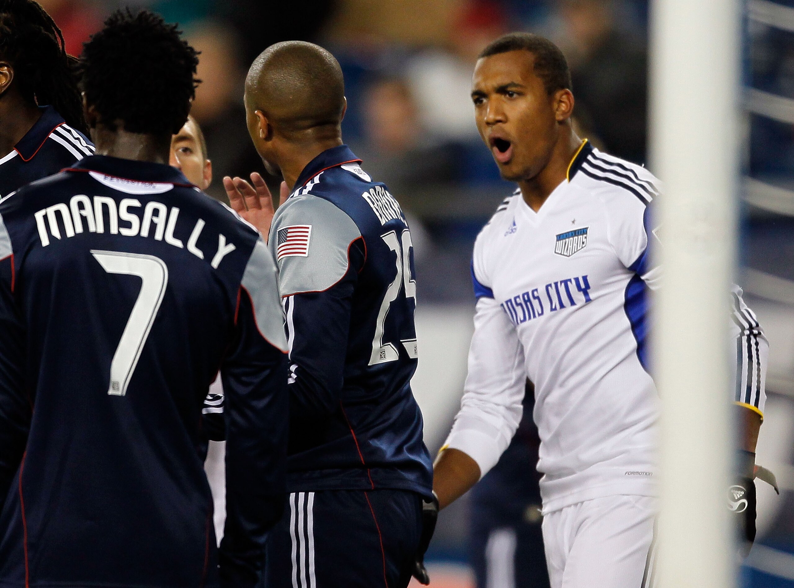 FOXBORO, MA - OCTOBER 16: Teal Bunbury #9 of the Kansas City Wizards has words in a scuffle with members of the New England Revolution in front of the net at Gillette Stadium on October 16, 2010 in Foxboro, Massachusetts. The Revolution won 1-0. (Photo b FOXBORO, MA - OCTOBER 16: Teal Bunbury #9 of the Kansas City Wizards has words in a scuffle with members of the New England Revolution in front of the net at Gillette Stadium on October 16, 2010 in Foxboro, Massachusetts. The Revolution won 1-0. (Photo b