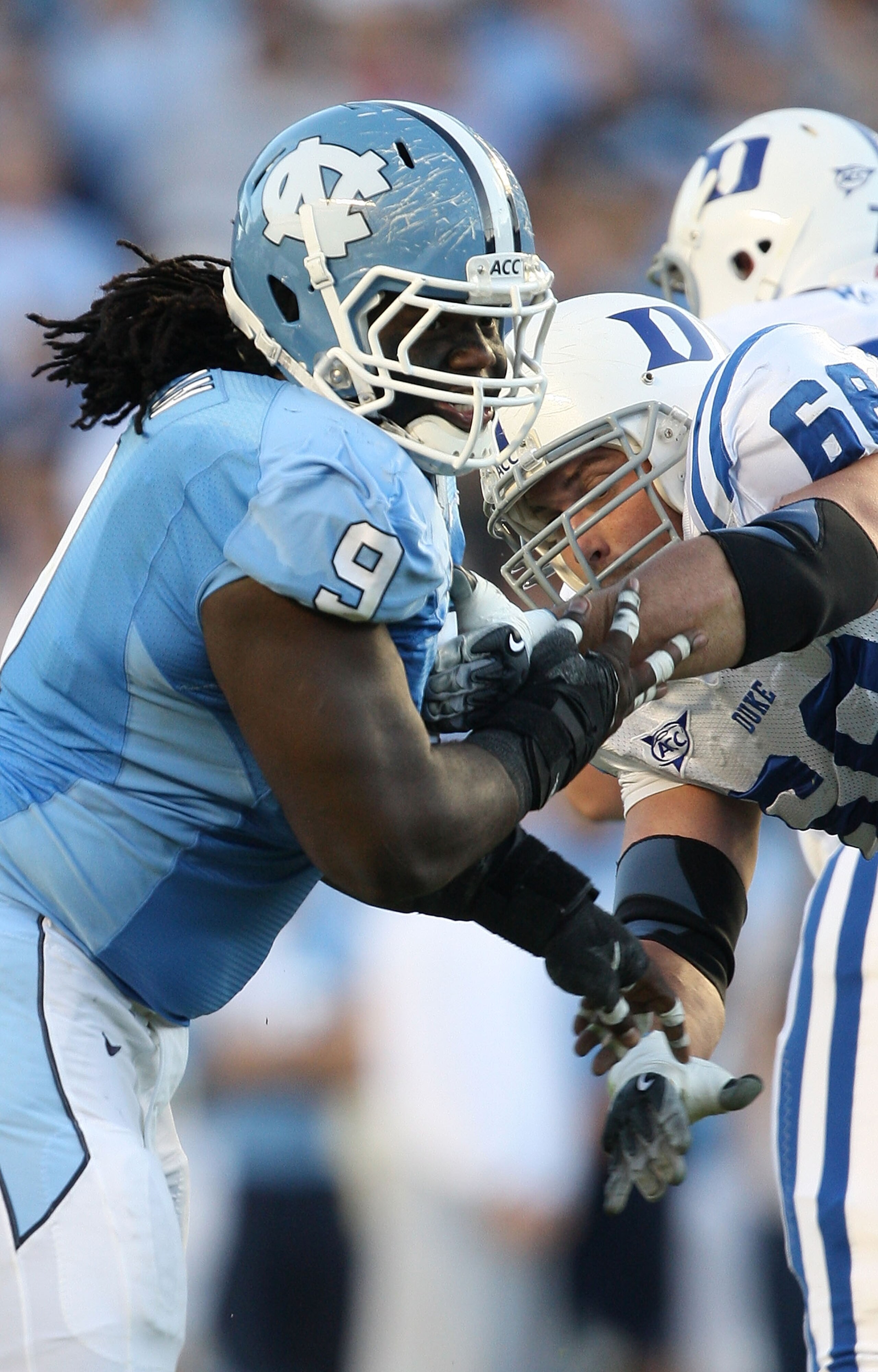 CHAPEL HILL, NC - NOVEMBER 07:  Marvin Austin #9 of the North Carolina Tar Heels goes after the Duke Blue Devils during their game at Kenan Stadium on November 7, 2009 in Chapel Hill, North Carolina.  (Photo by Streeter Lecka/Getty Images)