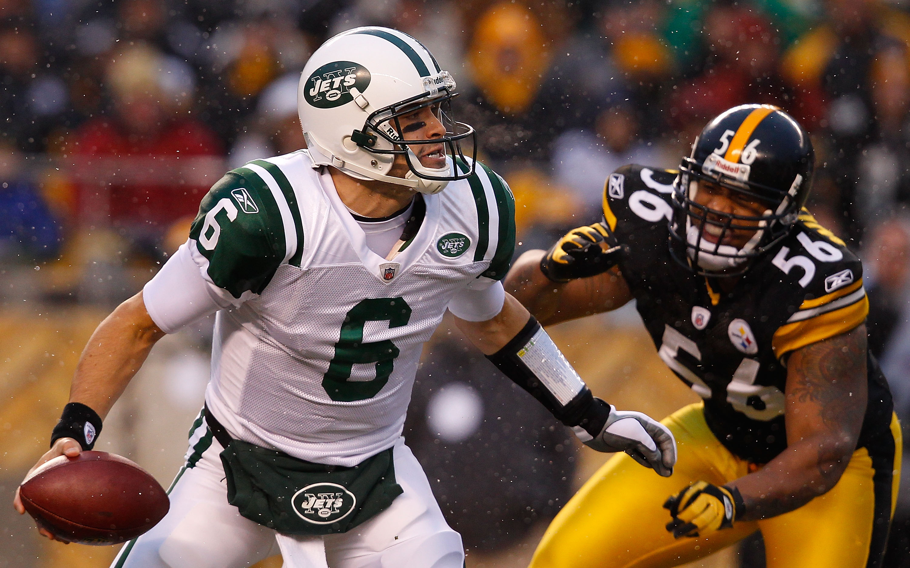 PITTSBURGH - DECEMBER 19:  Mark Sanchez #6 of the New York Jets is rushed by LaMarr Woodley #56 of the Pittsburgh Steelers during the game on December 19, 2010 at Heinz Field in Pittsburgh, Pennsylvania.  (Photo by Jared Wickerham/Getty Images)