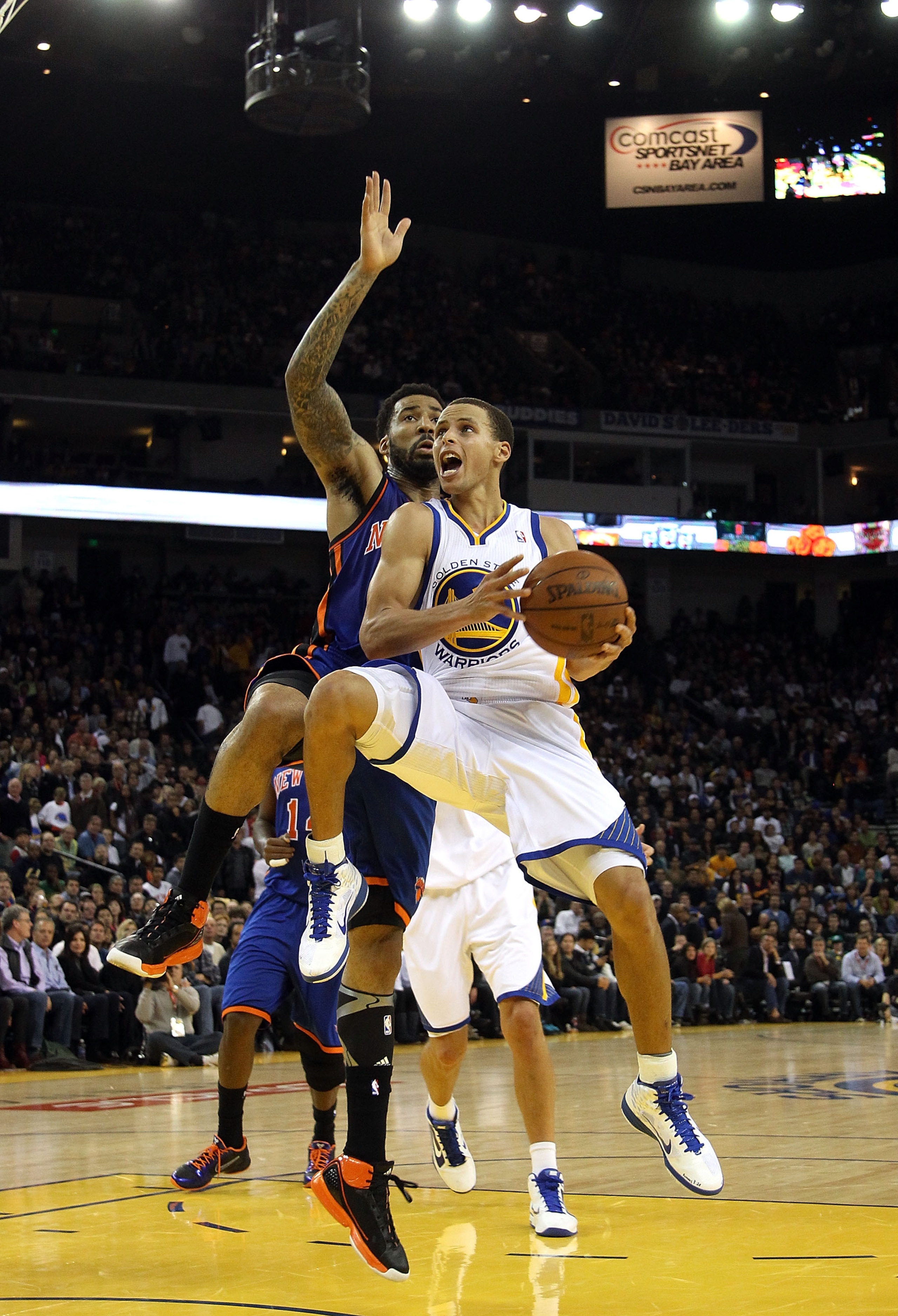 OAKLAND, CA - NOVEMBER 19: Stephen Curry #30 of the Golden State Warriors in action against the New York Knicks at Oracle Arena on November 19, 2010 in Oakland, California. NOTE TO USER: User expressly acknowledges and agrees that, by downloading and or OAKLAND, CA - NOVEMBER 19: Stephen Curry #30 of the Golden State Warriors in action against the New York Knicks at Oracle Arena on November 19, 2010 in Oakland, California. NOTE TO USER: User expressly acknowledges and agrees that, by downloading and or