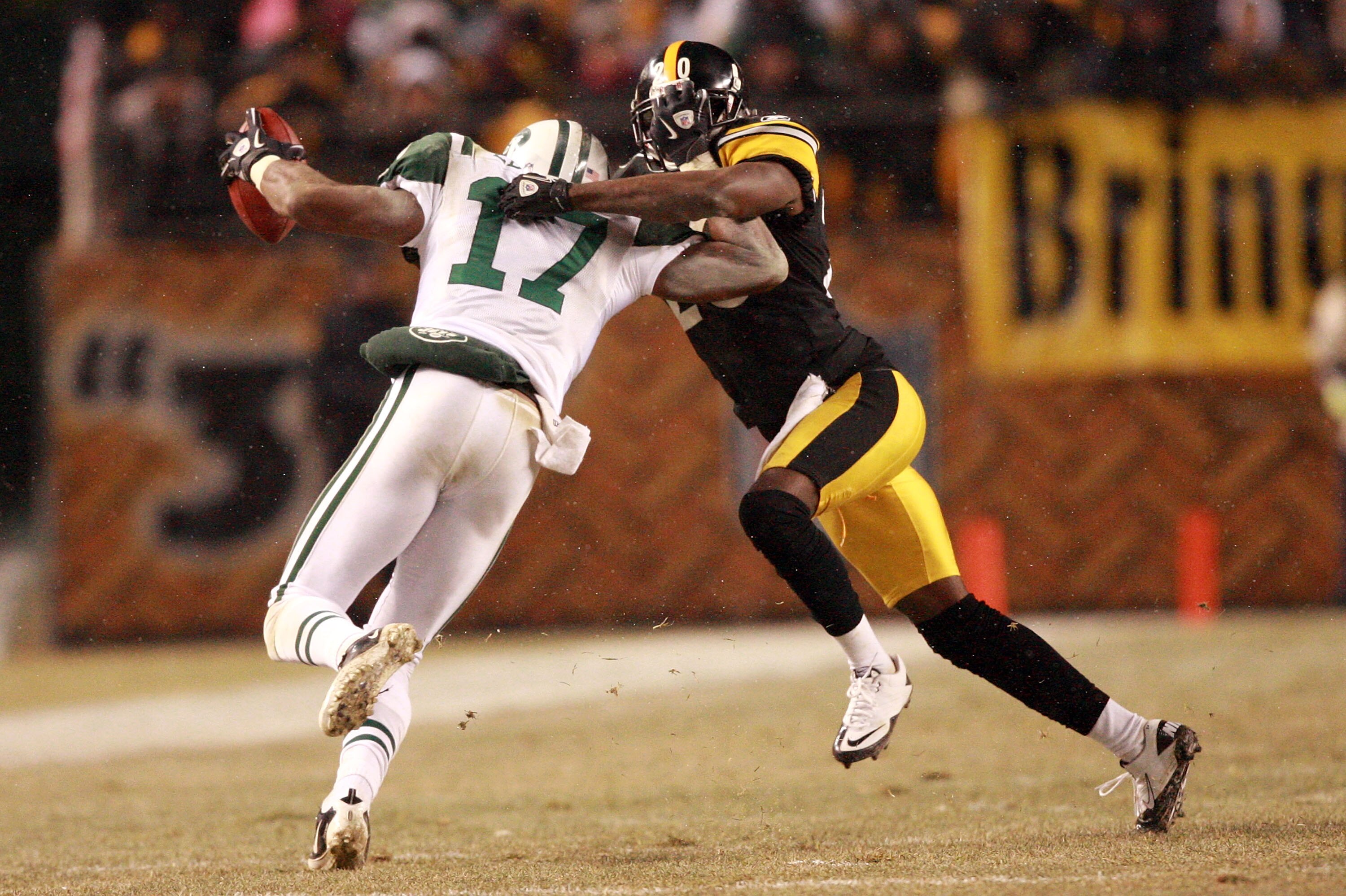 PITTSBURGH, PA - DECEMBER 19:  Braylon Edwards #17 of the New York Jets is tackled by Bryant McFadden #20 of the Pittsburgh Steelers during their game at Heinz Field on December 19, 2010 in Pittsburgh, Pennsylvania.  (Photo by Karl Walter/Getty Images)