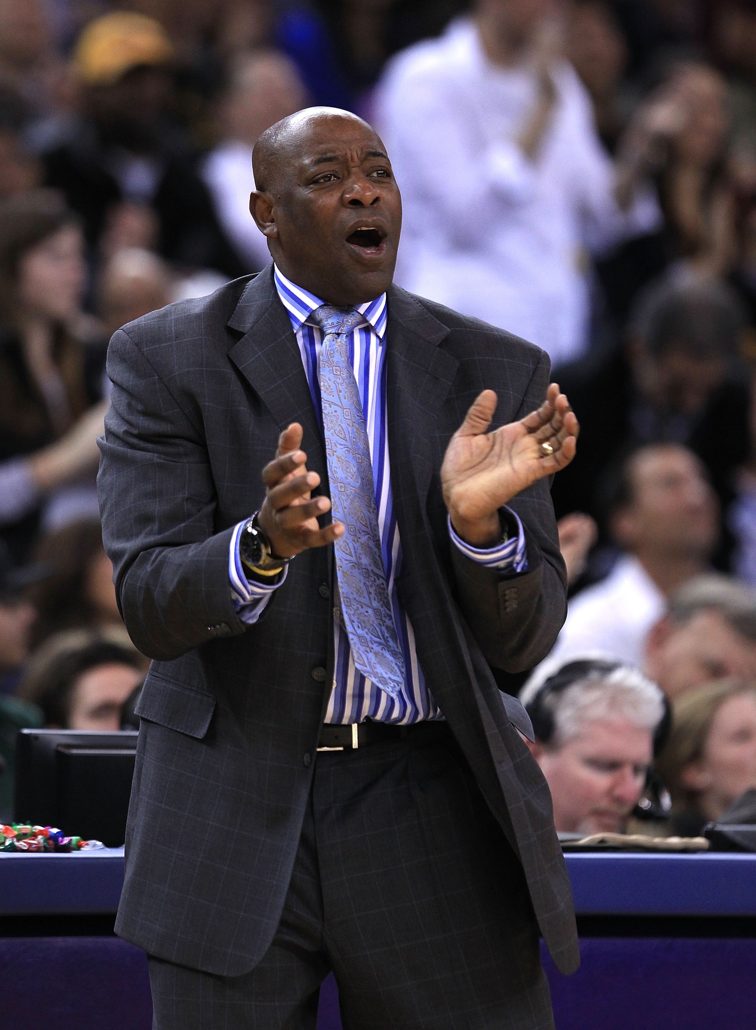 OAKLAND, CA - JANUARY 12: Head coach Keith Smart of the Golden State Warriors walks the sidelines during their game against the Los Angeles Lakers at Oracle Arena on January 12, 2011 in Oakland, California. NOTE TO USER: User expressly acknowledges and a OAKLAND, CA - JANUARY 12: Head coach Keith Smart of the Golden State Warriors walks the sidelines during their game against the Los Angeles Lakers at Oracle Arena on January 12, 2011 in Oakland, California. NOTE TO USER: User expressly acknowledges and a