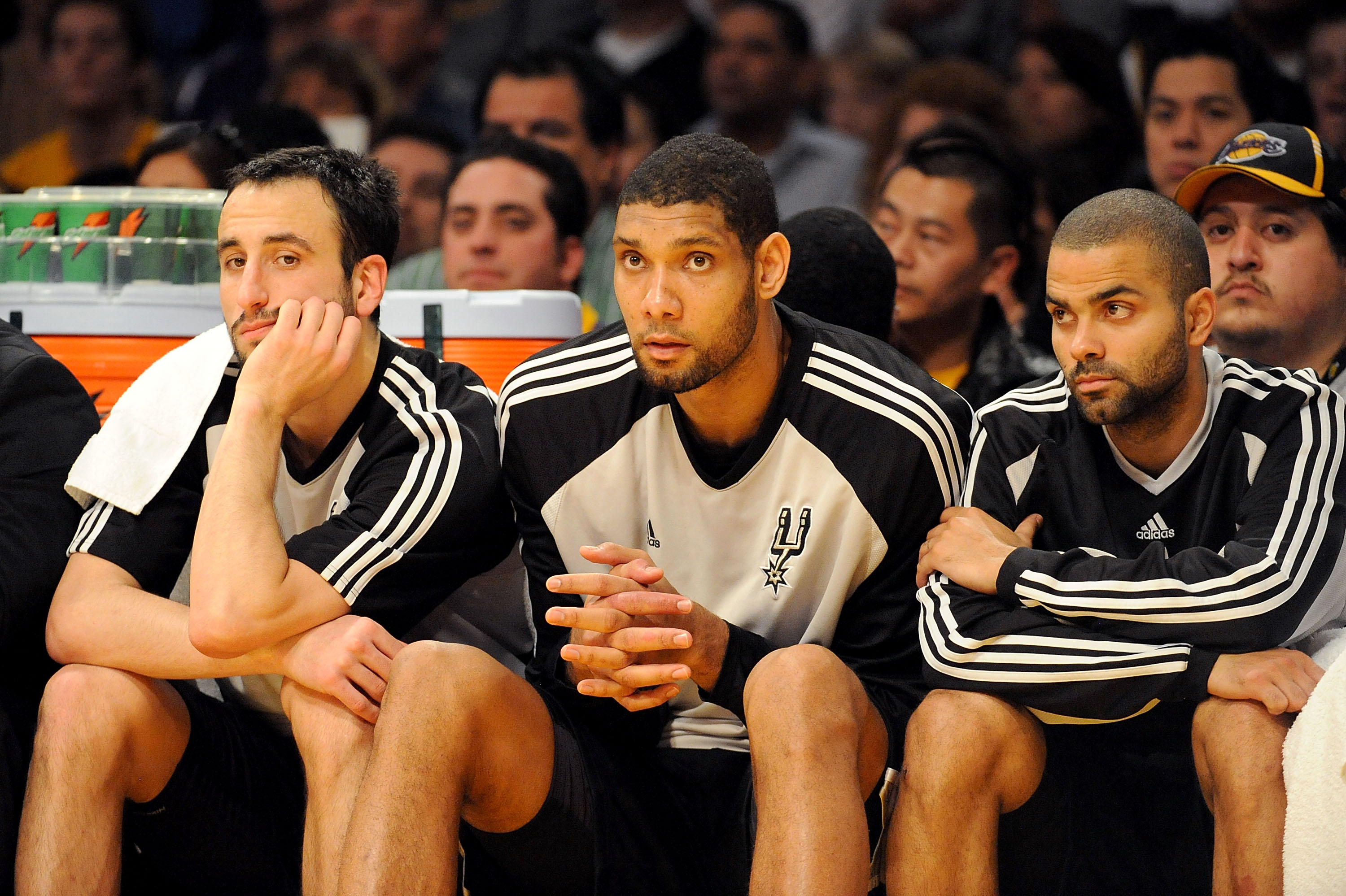 LOS ANGELES, CA - JANUARY 25: (L-R) Manu Ginobili #20, Tim Duncan #21, and Tony Parker #9 of the San Antonio Spurs watch from the sidelines during the third quarter against the Los Angeles Lakers at the Staples Center on January 25, 2009 in Los Angeles, LOS ANGELES, CA - JANUARY 25: (L-R) Manu Ginobili #20, Tim Duncan #21, and Tony Parker #9 of the San Antonio Spurs watch from the sidelines during the third quarter against the Los Angeles Lakers at the Staples Center on January 25, 2009 in Los Angeles,