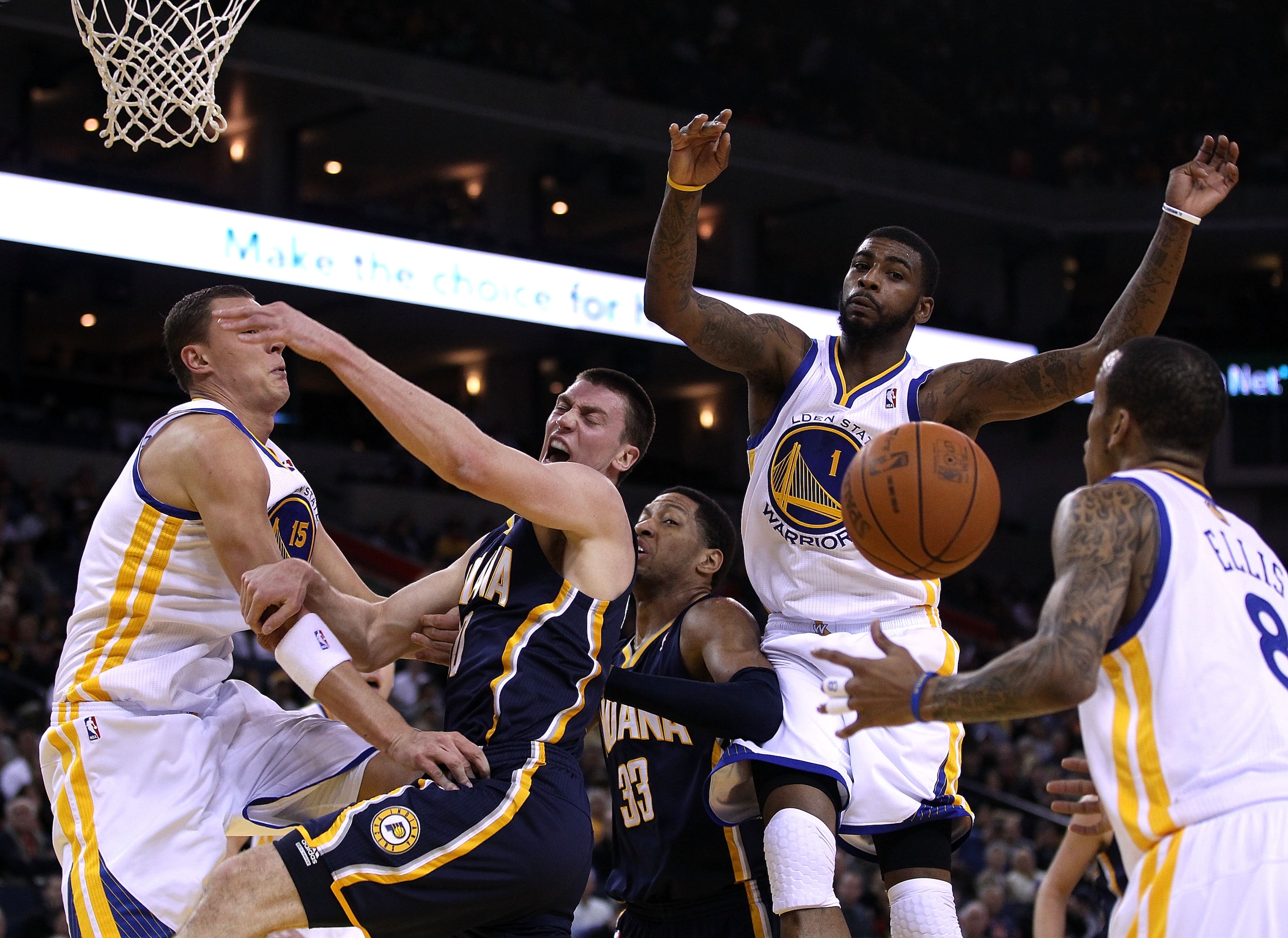 OAKLAND, CA - JANUARY 19: Tyler Hansbrough #50 of the Indiana Pacers has a shot blocked by Dorell Wright #1 of the Golden State Warriors at Oracle Arena on January 19, 2011 in Oakland, California. NOTE TO USER: User expressly acknowledges and agrees tha OAKLAND, CA - JANUARY 19: Tyler Hansbrough #50 of the Indiana Pacers has a shot blocked by Dorell Wright #1 of the Golden State Warriors at Oracle Arena on January 19, 2011 in Oakland, California. NOTE TO USER: User expressly acknowledges and agrees tha