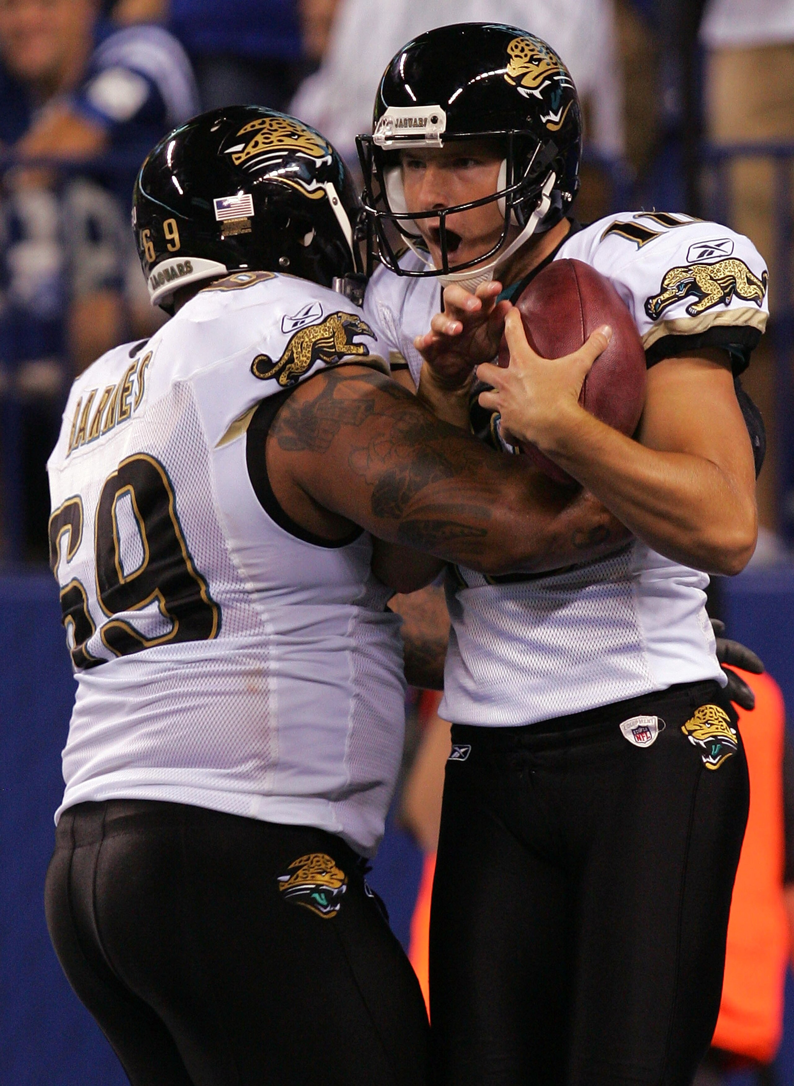INDIANAPOLIS - SEPTEMBER 21:  Kicker Josh Scobee #10 of the Jacksonville Jaguars celebrates his 51-yard game winning field goal with Khalif Barnes #69 against the Indianapolis Colts on September 21, 2008 at Lucas Oil Stadium in Indianapolis, Indiana.  (Ph