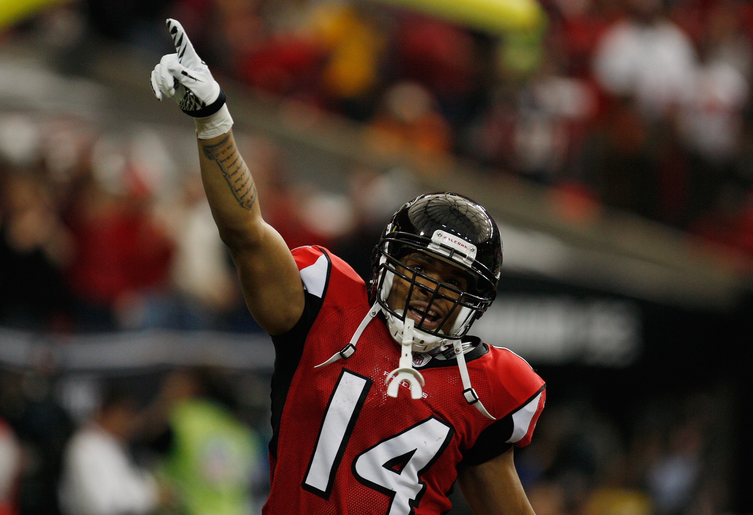 ATLANTA, GA - JANUARY 02: Eric Weems #14 of the Atlanta Falcons celebrates after his 55-yard punt return for a first quarter touchdown during the game against the Carolina Panthers at the Georgia Dome on January 2, 2011 in Atlanta, Georgia. (Photo by Sc ATLANTA, GA - JANUARY 02: Eric Weems #14 of the Atlanta Falcons celebrates after his 55-yard punt return for a first quarter touchdown during the game against the Carolina Panthers at the Georgia Dome on January 2, 2011 in Atlanta, Georgia. (Photo by Sc
