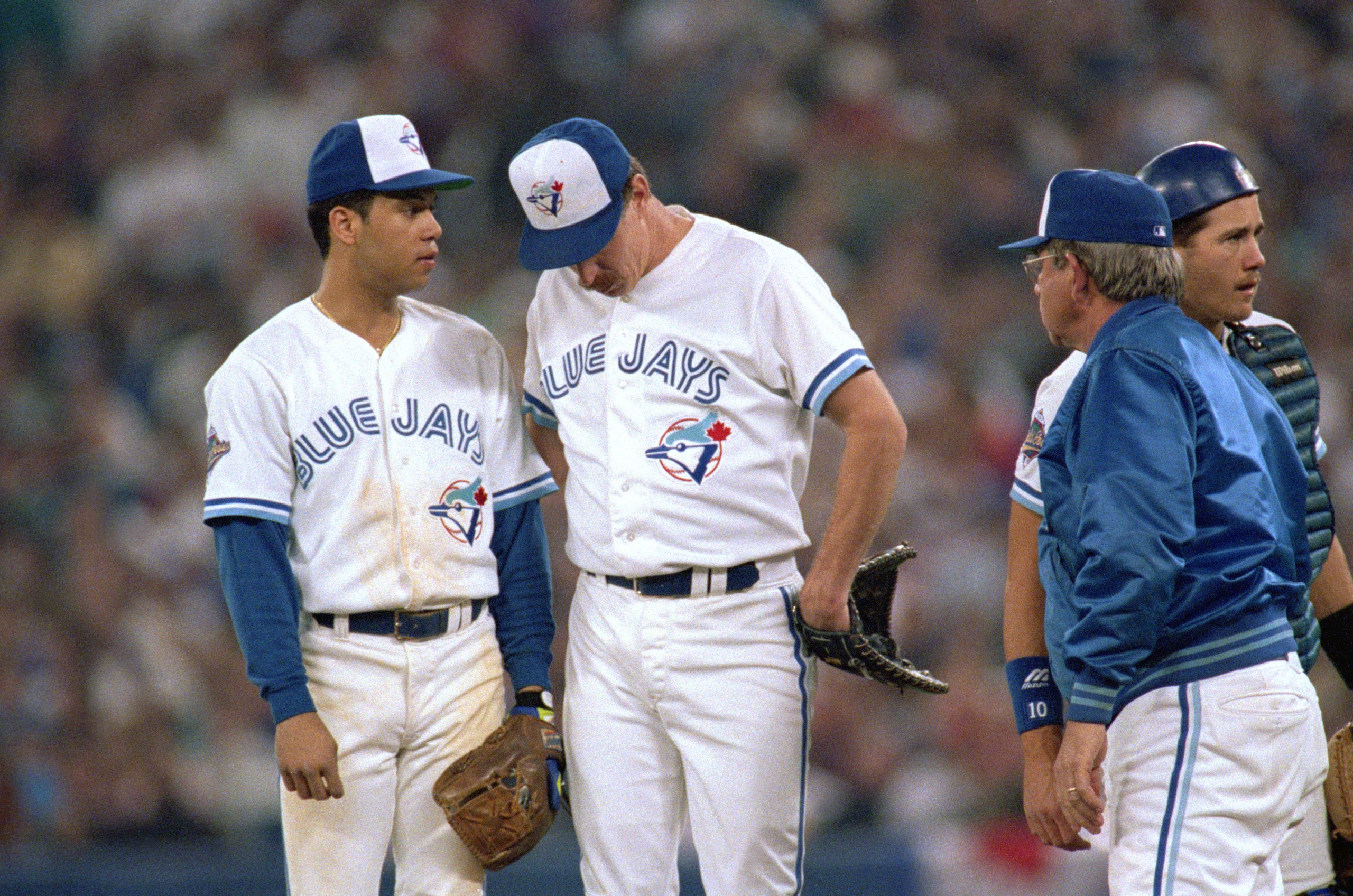 TORONTO - OCTOBER 22:  Roberto Alomar #12 of the Toronto Blue Jays (L) talks to his pitcher Jack Morris #47 during game 5 of the World Series aganst the Atlanta Braves at the SkyDome in Toronto, Ontario, Canada, on October 22, 1992. The Braves won 7-2. (P