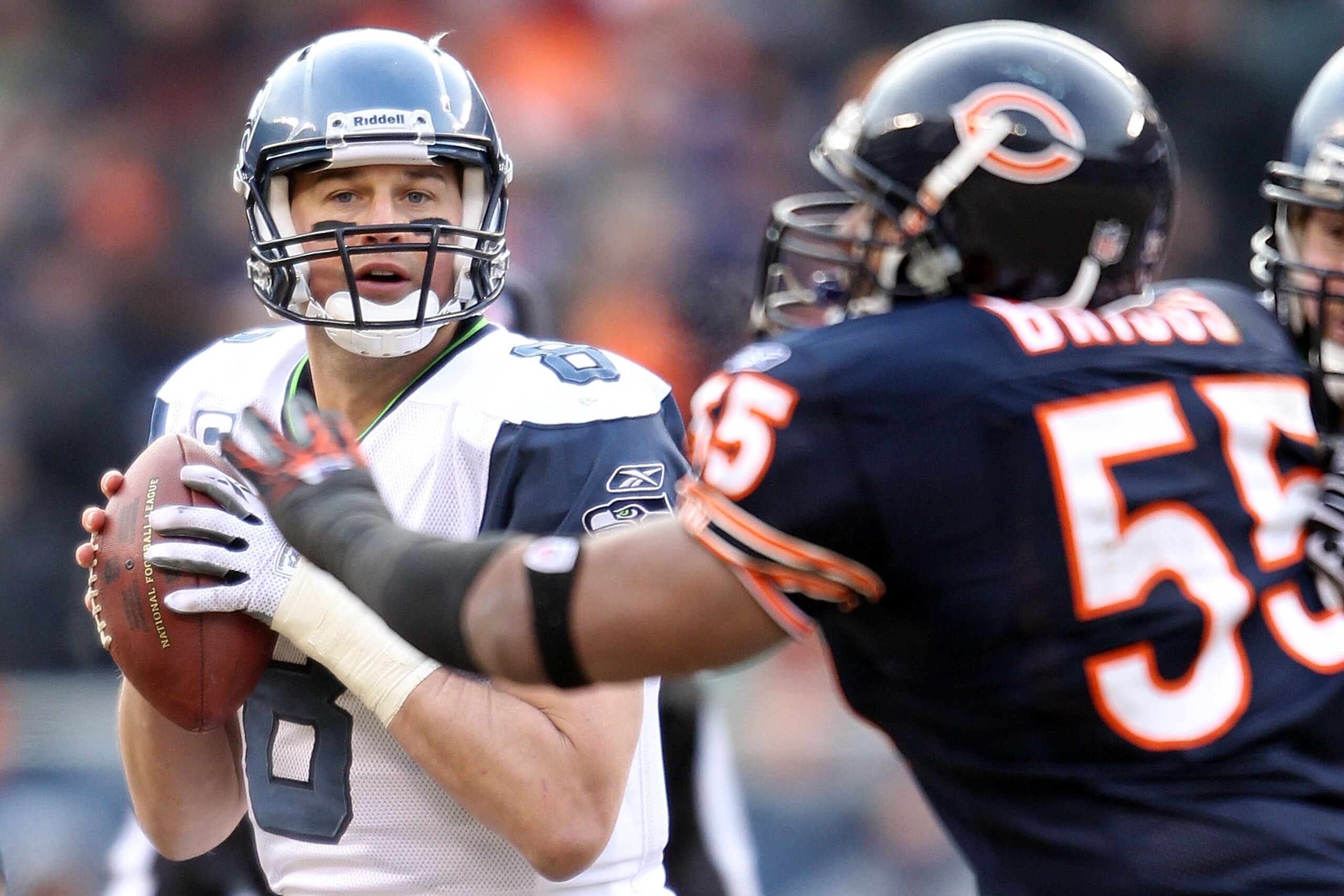 CHICAGO, IL - JANUARY 16:  Quarterback Matt Hasselbeck #8 of the Seattle Seahawks looks to pass against the Chicago Bears in the 2011 NFC divisional playoff game at Soldier Field on January 16, 2011 in Chicago, Illinois.  (Photo by Andy Lyons/Getty Images