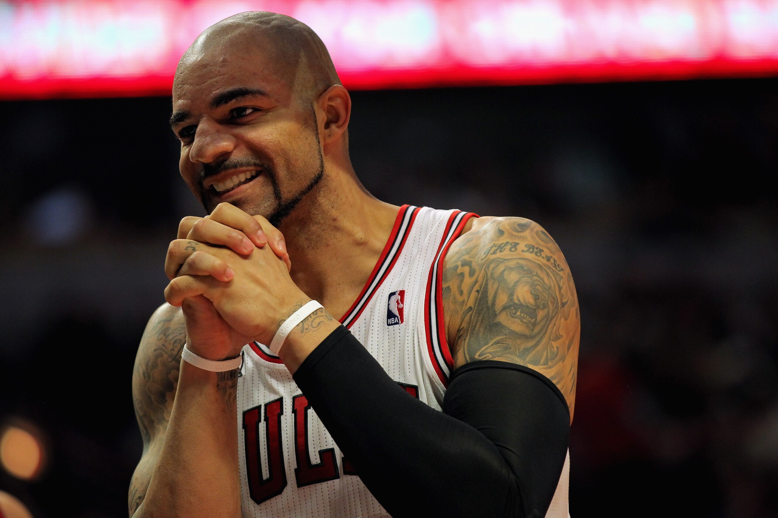 CHICAGO, IL - JANUARY 15: Carlos Boozer #5 of the Chicago Bulls reacts after a play against the Miami Heat at the United Center on January 15, 2011 in Chicago, Illinois. NOTE TO USER: User expressly acknowledges and agrees that, by downloading and or usi CHICAGO, IL - JANUARY 15: Carlos Boozer #5 of the Chicago Bulls reacts after a play against the Miami Heat at the United Center on January 15, 2011 in Chicago, Illinois. NOTE TO USER: User expressly acknowledges and agrees that, by downloading and or usi