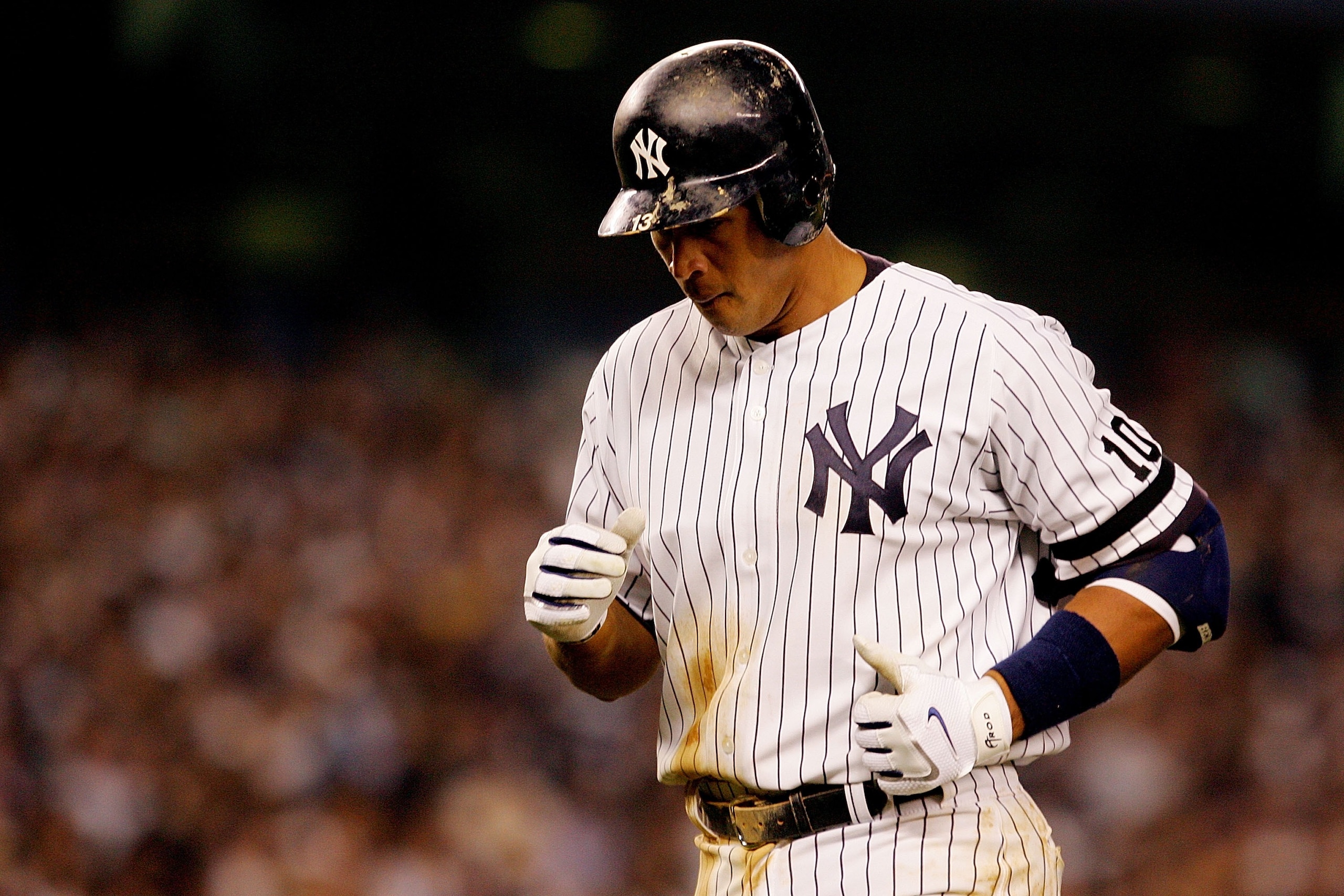 NEW YORK - OCTOBER 07:  Alex Rodriguez #13 of the New York Yankees runs back to the dugout after popping out in the fourth inning of Game Three of the American League Division Series against the Cleveland Indians at Yankee Stadium on October 7, 2007 in th