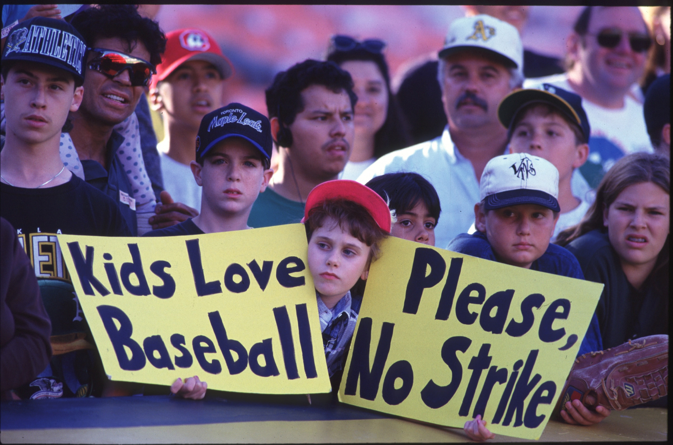 OAKLAND, CA - AUGUST 11:  Fan holds up a sign in protest of the baseball strike during a game between the Seattle Mariners and the Oakland Athletics at the Oakland Coliseum in Oakland, California.  The Mariners won the game 8-1. (Photo by Otto Greule/Gett