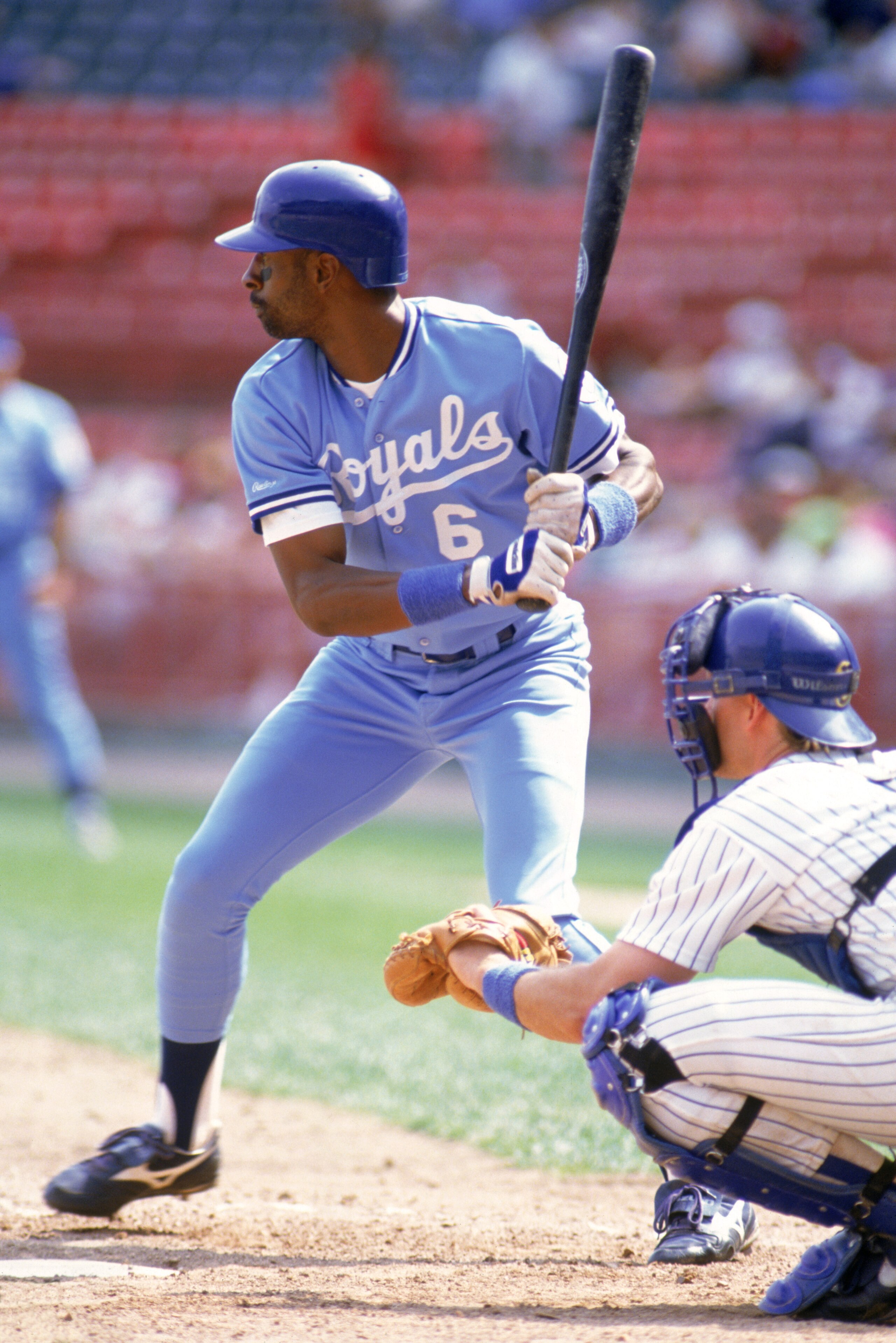 MILWAUKEE - 1990: Willie Wilson #6 of the Kansas City Royals stands ready at the plate during a game against the Milwaukee Brewers in 1990 at Milwaukee County Stadium in Milwaukee, Wisconsin. (Photo by Jonathan Daniel/Getty Images) MILWAUKEE - 1990: Willie Wilson #6 of the Kansas City Royals stands ready at the plate during a game against the Milwaukee Brewers in 1990 at Milwaukee County Stadium in Milwaukee, Wisconsin. (Photo by Jonathan Daniel/Getty Images)