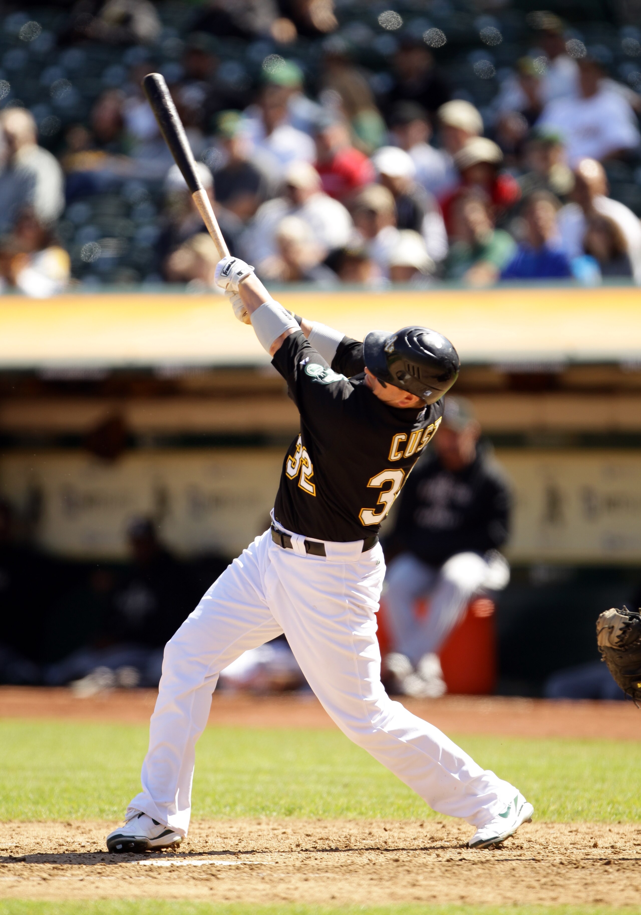 OAKLAND, CA - SEPTEMBER 22:  Jack Cust #32 of the Oakland Athletics hits a single to score Cliff Pennington and give the Athletics a 2-0 lead in the sixth inning against the Chicago White Sox at the Oakland-Alameda County Coliseum on September 22, 2010 in
