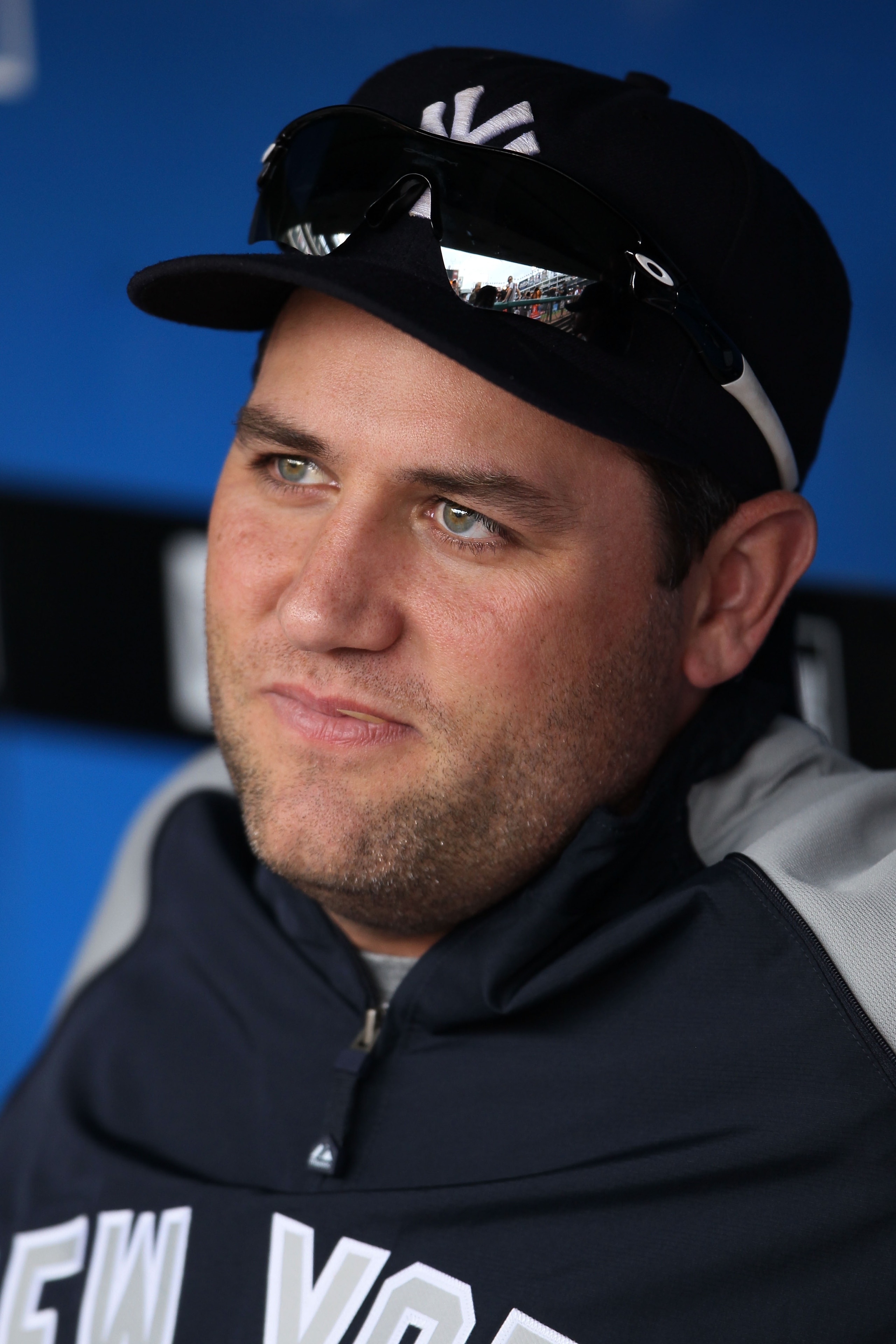 ARLINGTON, TX - OCTOBER 22:  Lance Berkman #17 of the New York Yankees sits in the dugout prior to playing the Texas Rangers in Game Six of the ALCS during the 2010 MLB Playoffs at Rangers Ballpark in Arlington on October 22, 2010 in Arlington, Texas.  (P