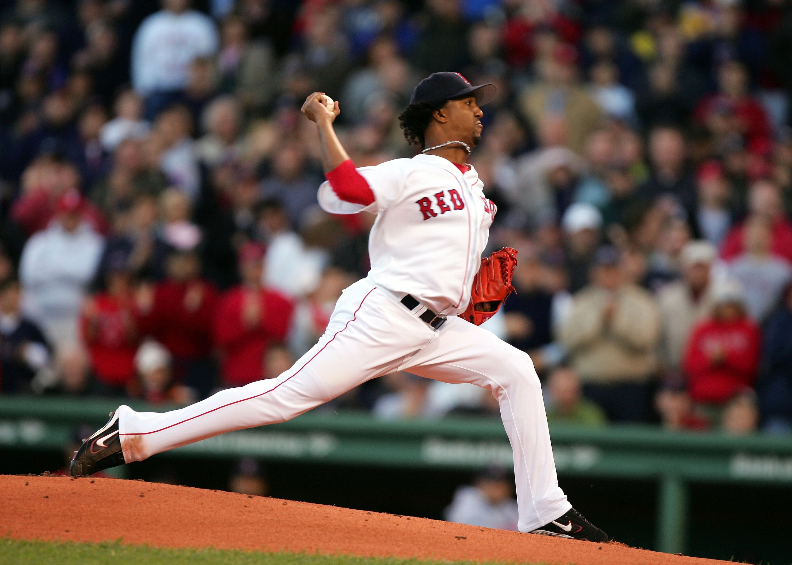 BOSTON - OCTOBER 18:  Pitcher Pedro Martinez #45 of the Boston Red Sox throws a pitch against the New York Yankees in the first inning during game five of the American League Championship Series on October 18, 2004 at Fenway Park in Boston, Massachusetts.