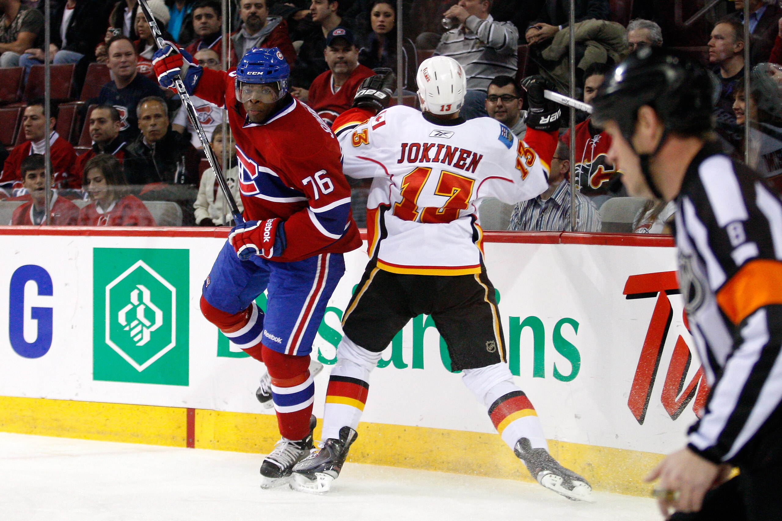 MONTREAL, CANADA - JANUARY 17:  P.K. Subban #76 of the Montreal Canadiens body checks Olli Jokinen #13 of the Calgary Flames during the NHL game at the Bell Centre on January 17, 2011 in Montreal, Quebec, Canada.  (Photo by Richard Wolowicz/Getty Images)