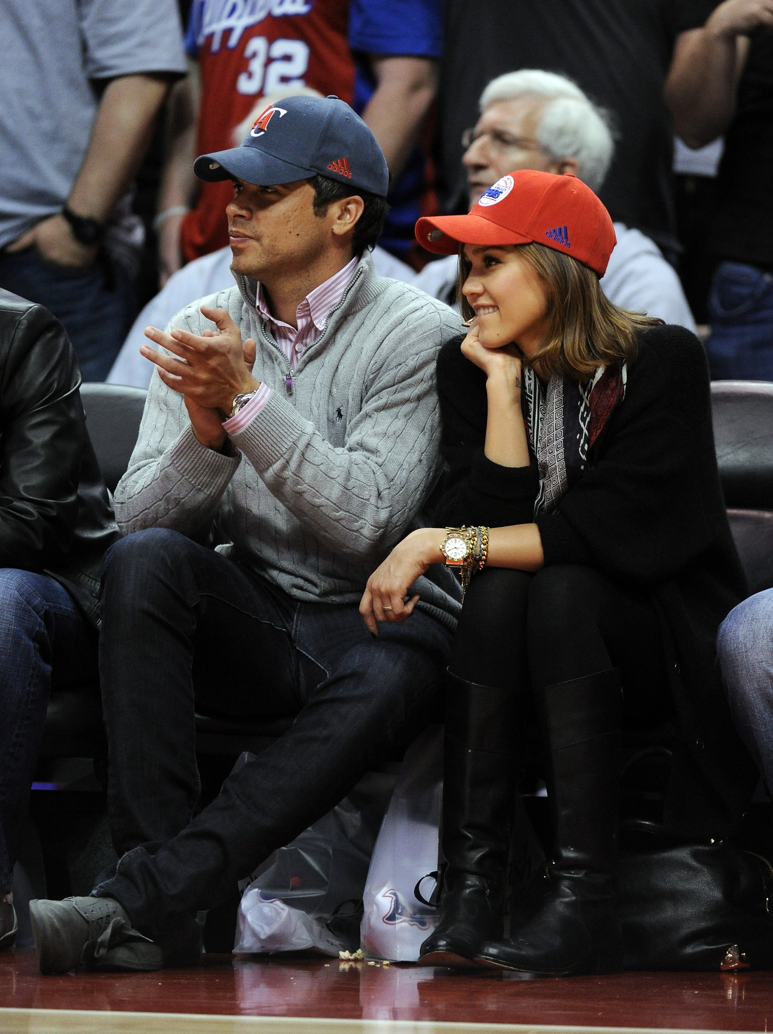 LOS ANGELES, CA - JANUARY 12:  Jessica Alba and Cash Warren take in the game between the Miami Heat and the Los Angeles Clippers at Staples Center on January 12, 2011 in Los Angeles, California.  NOTE TO USER: User expressly acknowledges and agrees that,