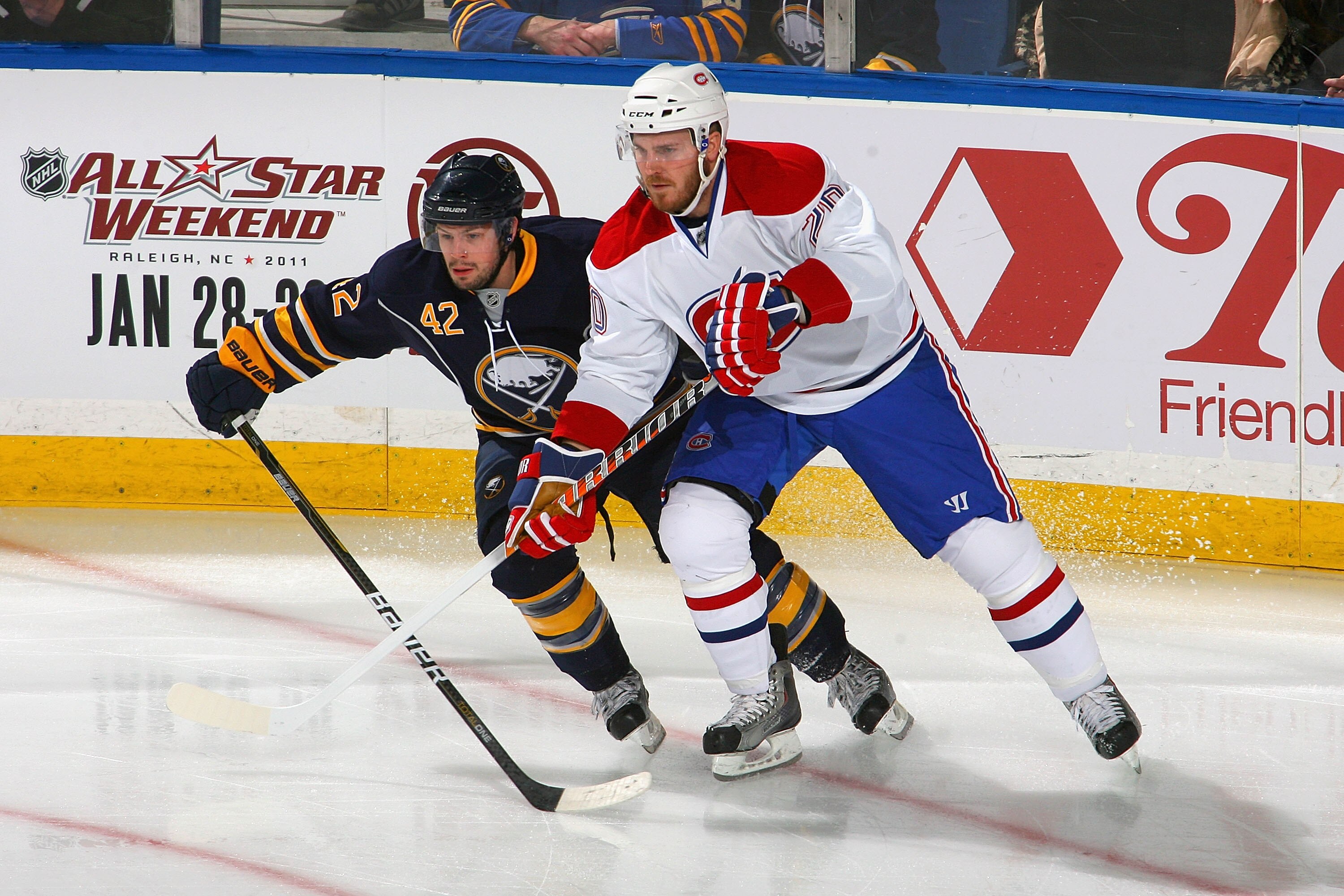 BUFFALO, NY - JANUARY 18: Nathan Gerbe #42 of the Buffalo Sabres skates against James Wisniewski #20 of the Montreal Canadiens at HSBC Arena on January 18, 2011 in Buffalo, New York.  (Photo by Rick Stewart/Getty Images)