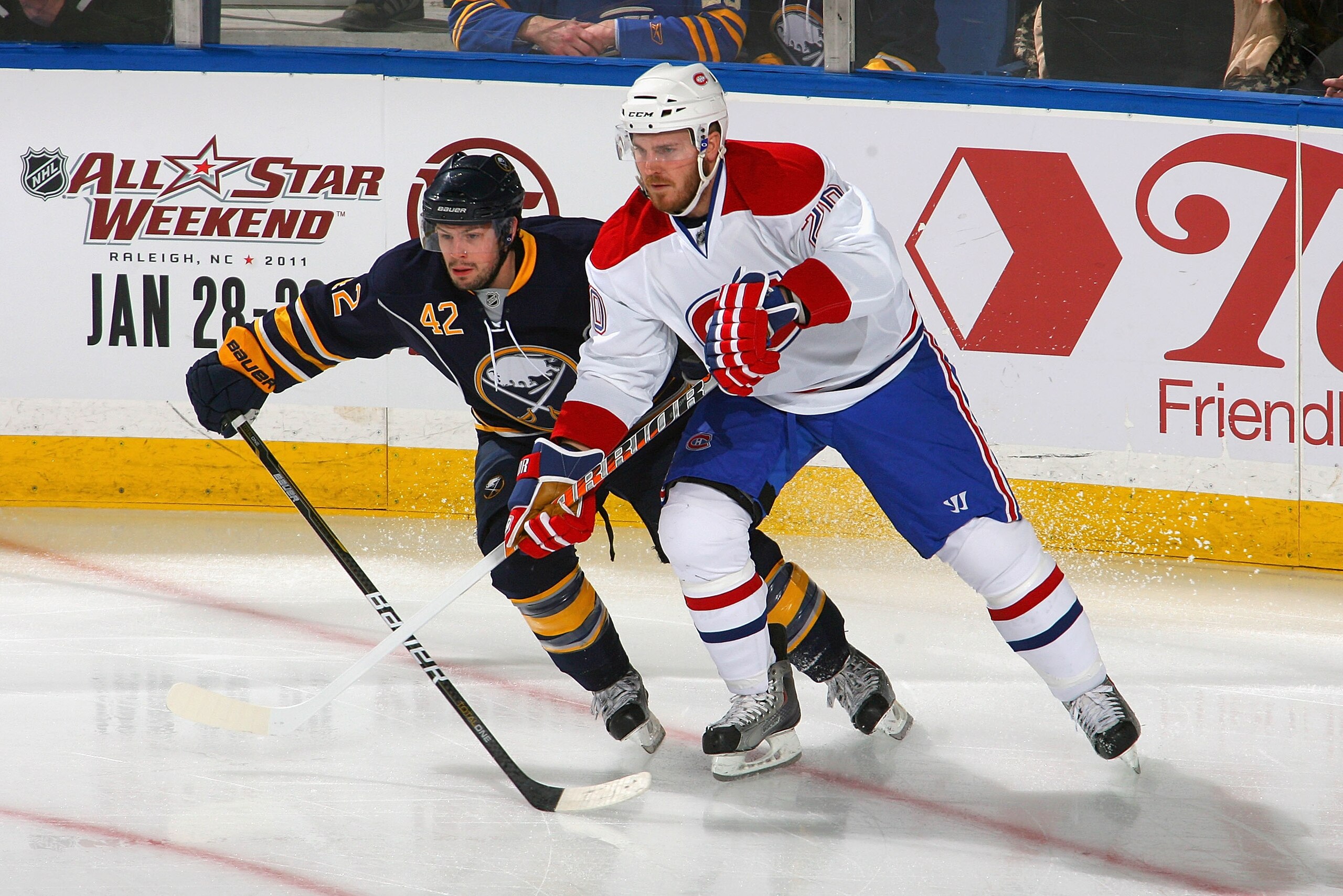 BUFFALO, NY - JANUARY 18: Nathan Gerbe #42 of the Buffalo Sabres skates against James Wisniewski #20 of the Montreal Canadiens at HSBC Arena on January 18, 2011 in Buffalo, New York.  (Photo by Rick Stewart/Getty Images)