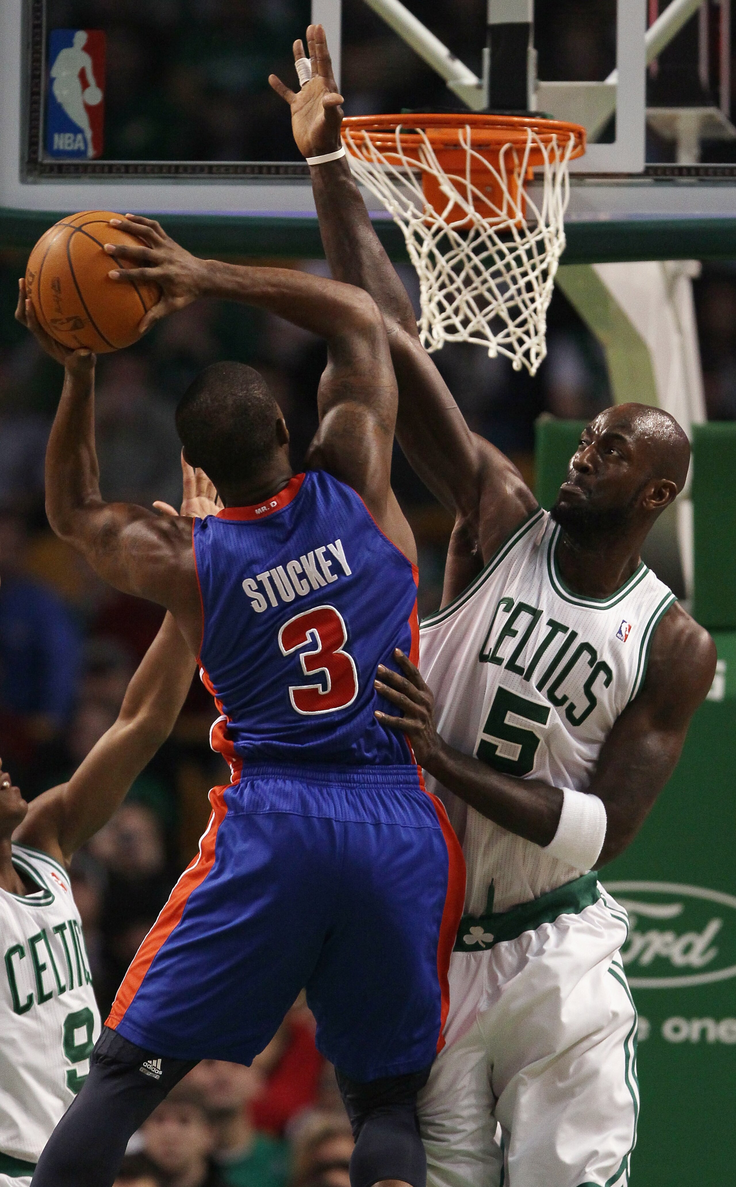 BOSTON, MA - JANUARY 19:  Kevin Garnett #5 of the Boston Celtics blocks as Rodney Stuckey #3 of the Detroit Pistons takes a shot on January 19, 2011 at the TD Garden in Boston, Massachusetts.  NOTE TO USER: User expressly acknowledges and agrees that, by