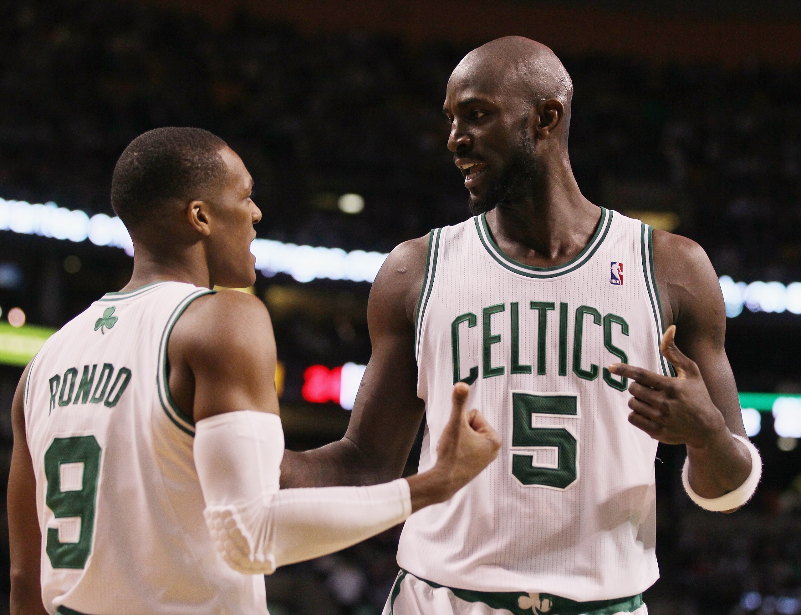 BOSTON, MA - JANUARY 17:  Kevin Garnett #5 and Rajon Rondo #9 of the Boston Celtics talk before the Orlando Magic pass the ball in bounds on January 17, 2011 at the TD Garden in Boston, Massachusetts. The Celtics defeated the Magic 109-106.  NOTE TO USER: